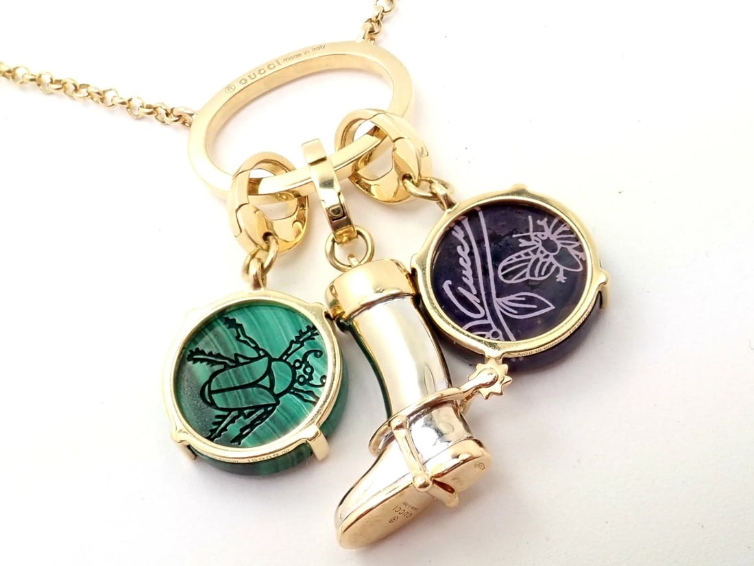 Rare! Authentic Gucci 18k Yellow White Gold Riding Boot + Beetle Charm Necklace: Rare! Authentic Gucci 18k Yellow White Gold Riding Boot + Beetle Charm Necklace About This Piece: Metal: 18k Yellow + White Gold Dimensions: Necklace Chain Length: 16", 15", 14" (Adjustable) Yellow/Wh