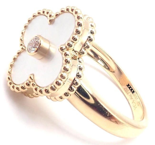 Van Cleef & Arpels Vintage Alhambra 18k Yellow Gold Mother Of Pearl Diamond Ring: Van Cleef & Arpels Vintage Alhambra 18k Yellow Gold Mother Of Pearl Diamond Ring About This Piece: The Van Cleef & Arpels Vintage Alhambra ring, made from 18k yellow gold, showcases a signature clover