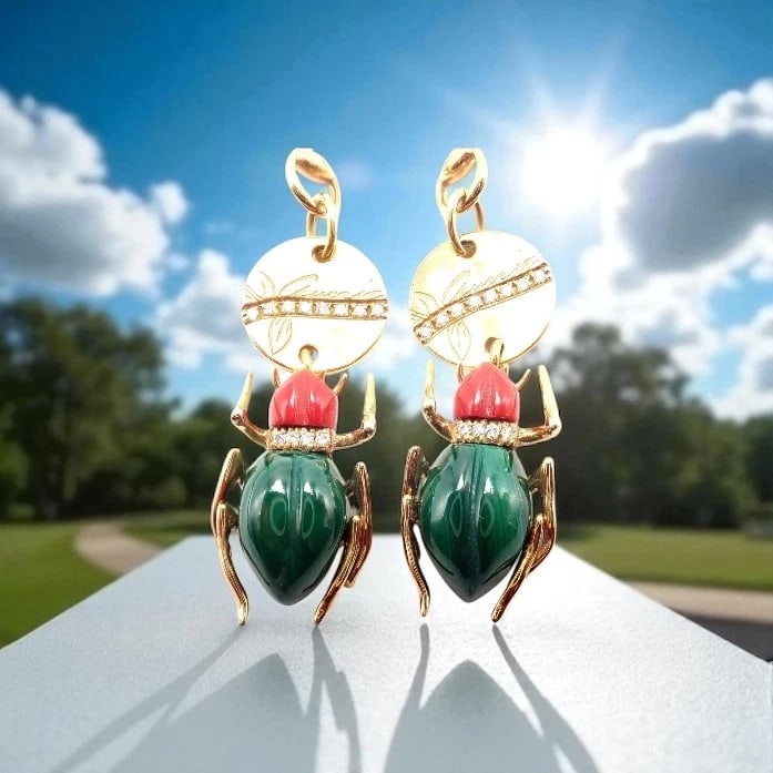 Authentic! Gucci 18k Yellow Gold Diamond Malachite Carnelian Scarab Earrings: Authentic! Gucci 18k Yellow Gold Diamond Malachite Carnelian Scarab Earrings About This Piece: These Gucci earrings feature intricately crafted scarab beetles in rich malachite and vibrant carnelian,