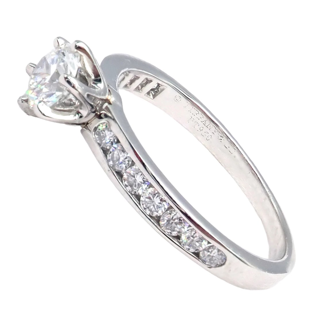 Authentic Tiffany & Co. Platinum 0.59ctw Diamond Engagement Ring sz 5.25: Authentic Tiffany & Co. Platinum 0.59ctw Diamond Engagement Ring sz 5.25 About This Piece: Authentic Tiffany & Co. engagement ring, size 5.25, elegantly crafted in platinum. It spotlights a breathtaki