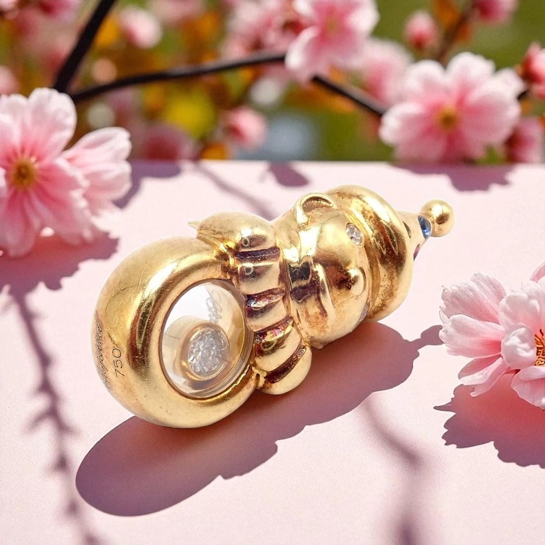 Authentic! Chopard 18k Yellow Gold Clown Happy Diamond Ruby Sapphire Pin Brooch: This authentic Chopard 18k Yellow Gold Clown Happy Diamond Pin Brooch is playful yet luxurious. Featuring a whimsical clown design, it is accented with rubies, sapphires, emeralds, and diamonds. At it