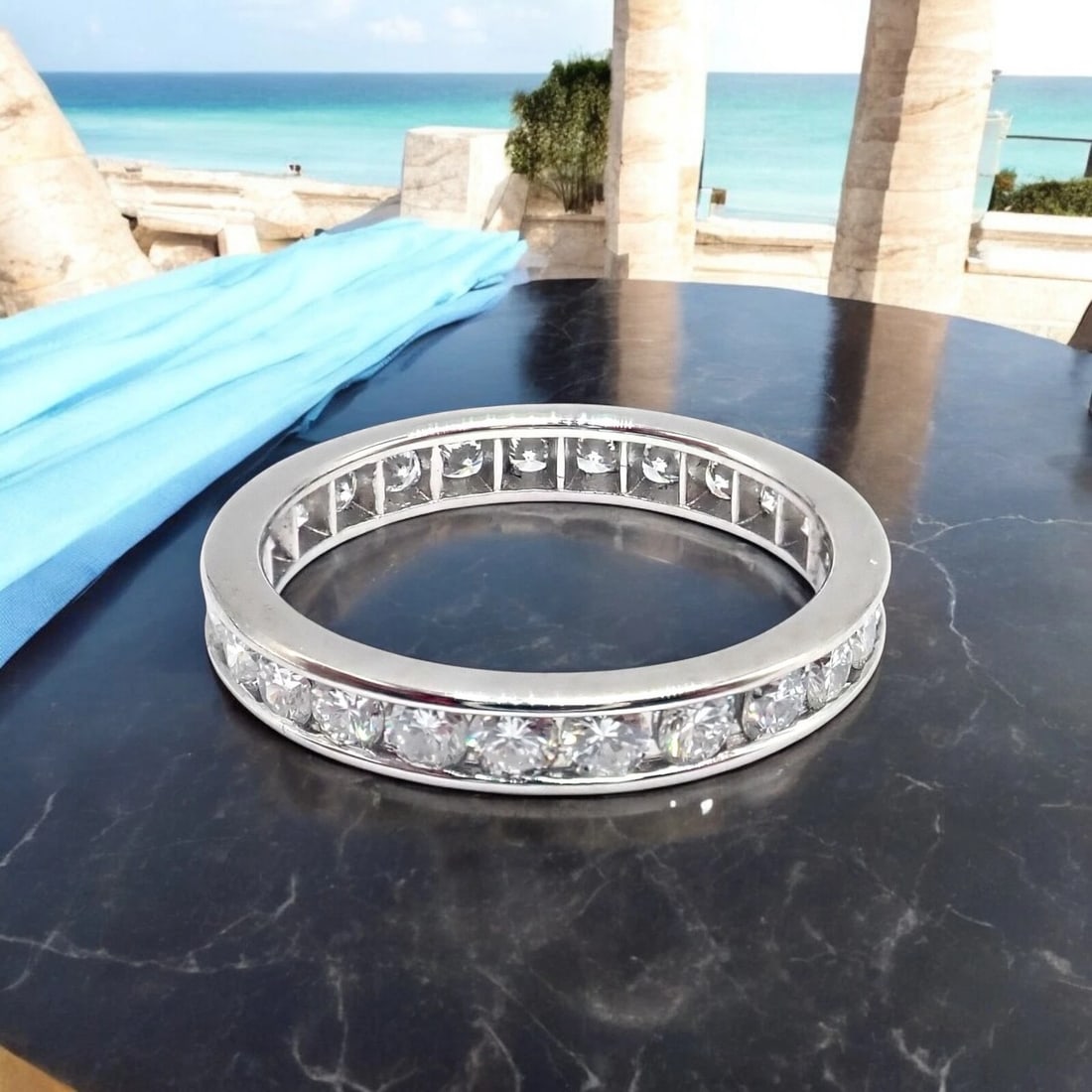 Tiffany & Co Platinum 0.80ct Diamond Full Circle Eternity 3mm Band Ring sz 4.5: This exquisite Tiffany & Co. full-circle eternity band is crafted in luxurious platinum and set with 0.80ct of brilliant diamonds. Measuring 3mm wide and size 4.5, this timeless wedding ring symbolize