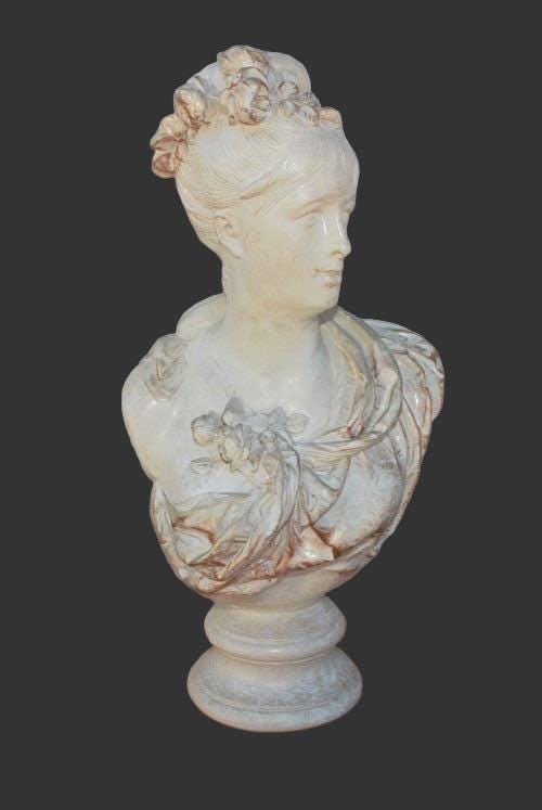 Vintage Victorian Bust Sculpture: Title: Vintage Victorian Bust Sculpture Description: Vintage Victorian Bust Our collection features a Hollywood Regency cast plaster portrait of a young lady. Flowers and ribbons beautifully accent th