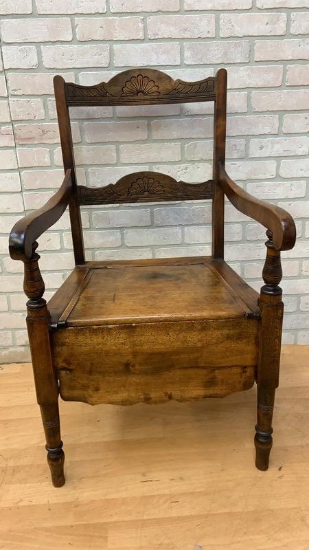 Antique Oak Commode Armchair: Title: Antique Oak Commode Armchair Description: Materials: wood, metal, oak Overall width: 21.5 inches Overall height: 37 inches Overall depth: 20 inches Seat height: 17 inches *** Shipping is NOT $1