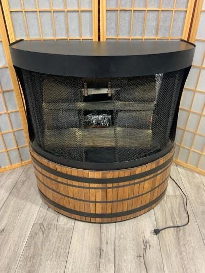 Vintage Modern Black Wood Free Standing Indoor Fireplace: Title: Vintage Modern Black Wood Free Standing Indoor Fireplace Description: Vintage Modern Black Wood Free Standing Indoor Fireplace Black wooden electric fireplace. Circa Mid 20th Century Dimensions