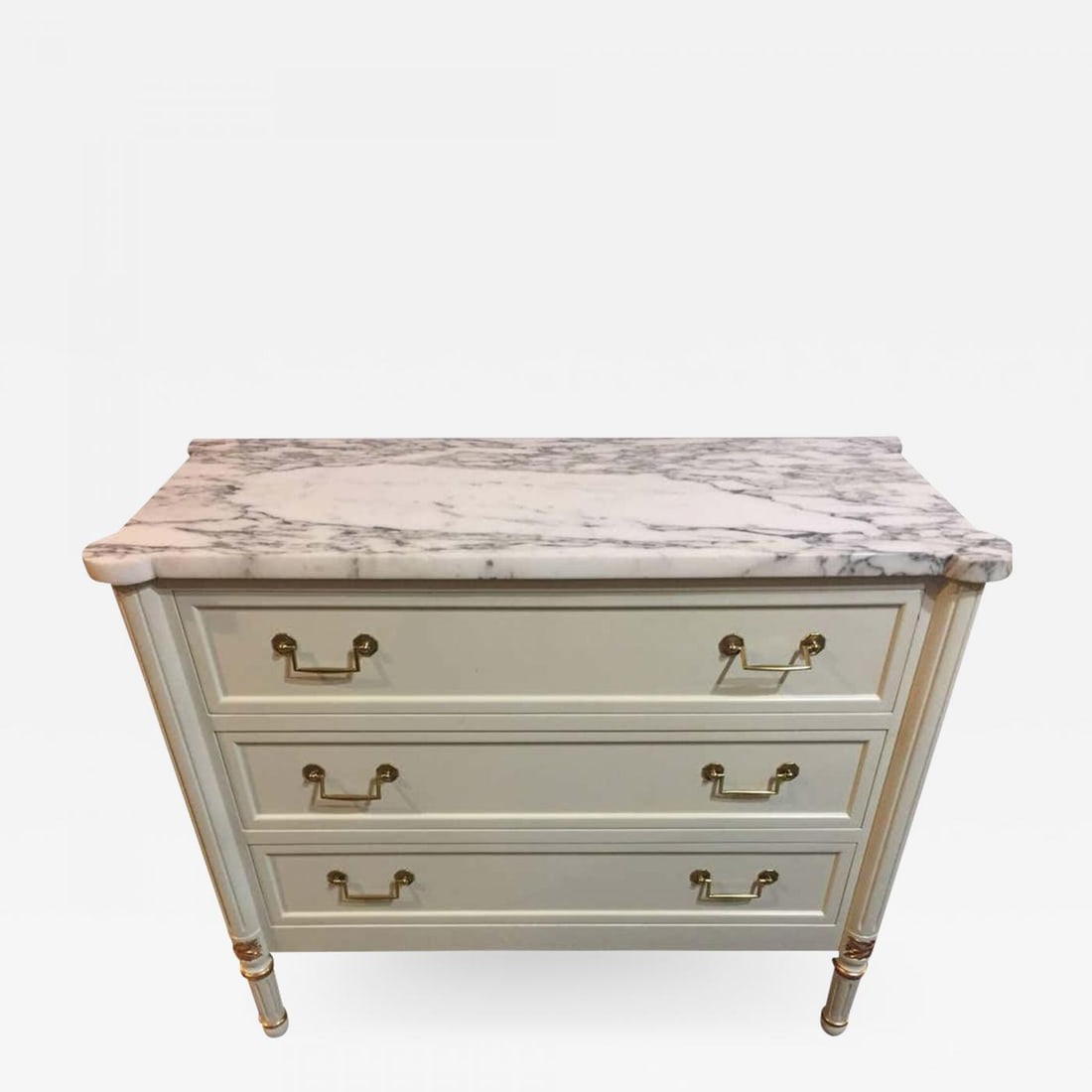 Hollywood Regency Louis XVI Style Commode Nightstand Jansen Attributed: Title: Hollywood Regency Louis XVI Style Commode Nightstand Jansen Attributed Description: Marble-Top Louis XVI style commode nightstand attributed Jansen. This fine parcel paint and gilt decorated st