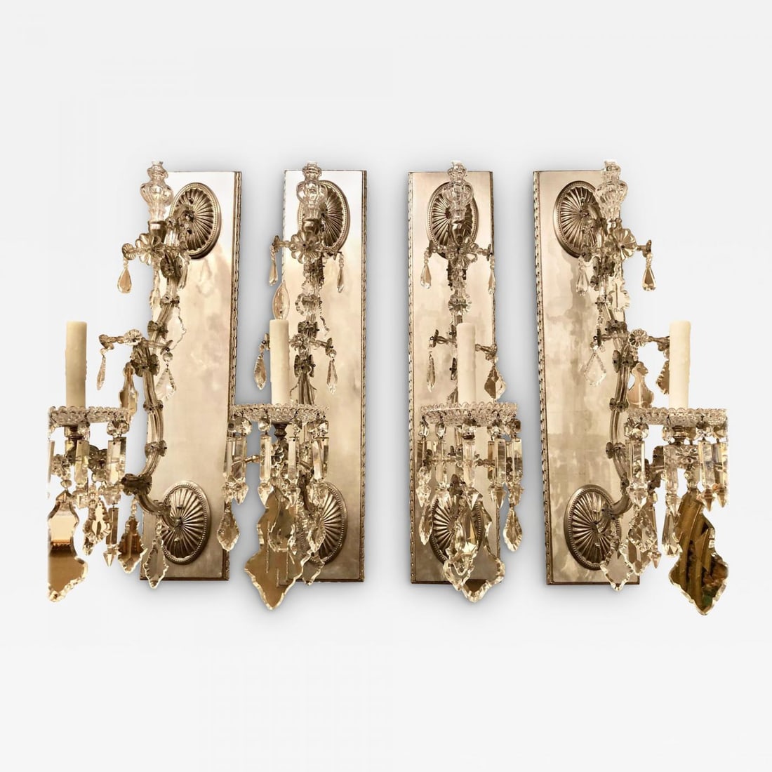 Hollywood Regency Silver Gilt Wall Scones with Crystal Set of Four: Title: Hollywood Regency Silver Gilt Wall Scones with Crystal Set of Four Description: Hollywood Regency Silver gilt wall scones with crystal set of four. A finely gilt set of four palatial silver one