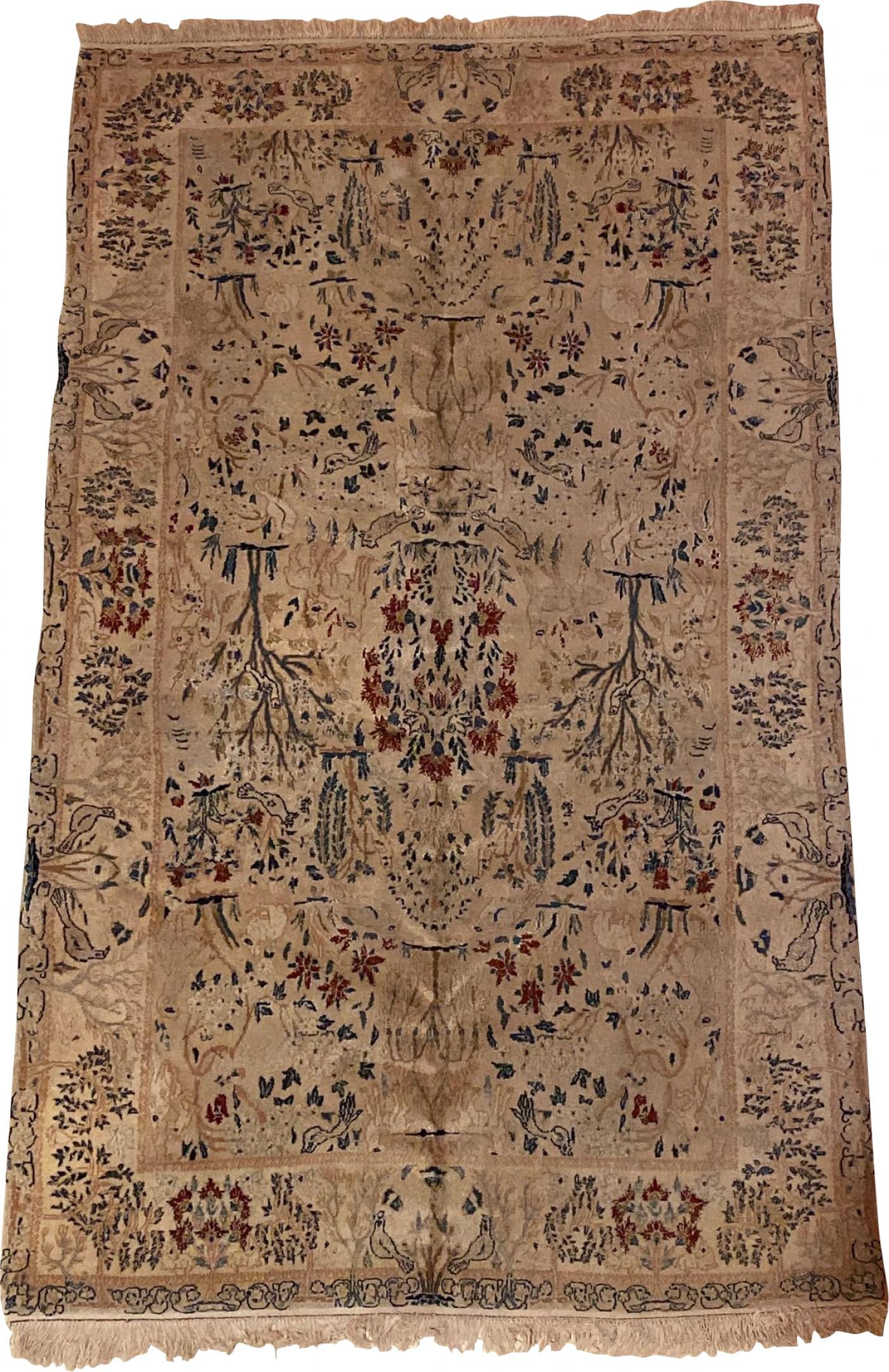 1970s Pakistani Wool Handwoven Carpet: Title: 1970s Pakistani Wool Handwoven Carpet Description: A 1970s Pakistani wool handwoven carpet having a very tightly woven loom with birds, rabbits, trees and deer in a forest. A fine example of an