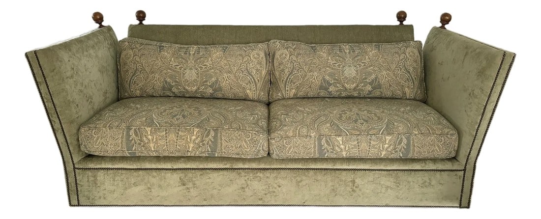 2000s Vintage Baker Furniture Co. English Traditional Knole Style Olive Green Velvet Sofa: Sophistication abounds with this handsome vintage Knole sofa from Baker Furniture Co. This finely crafted piece is upholstered in a plush olive green velvet with down-filled paisley fabric cushions, f