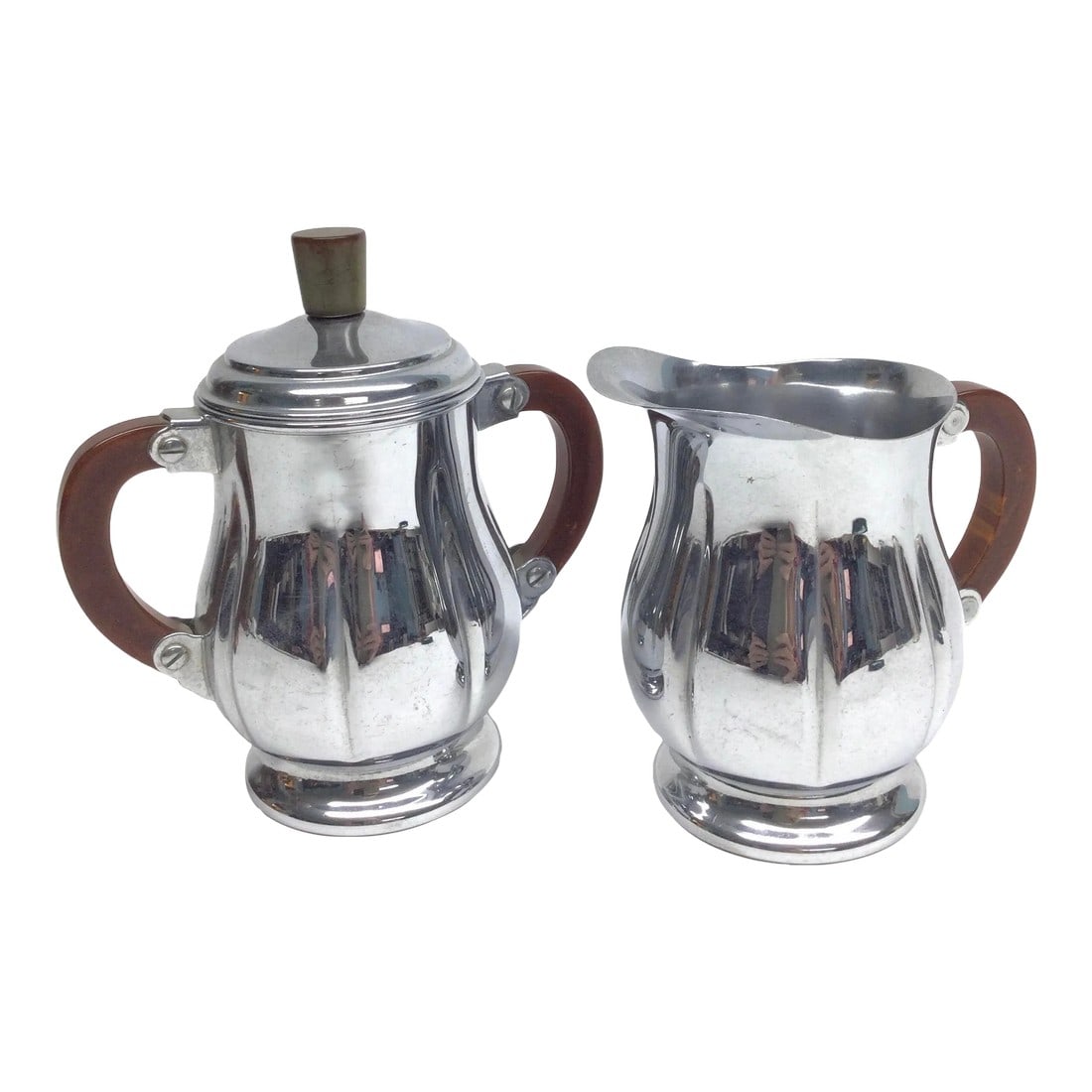 Art Deco Bakelite Farber Bros Krome Kraft Cream and Sugar Stainless: Stunning Art Deco era cream and sugar set by Fabre Bros. Use this set in the dining room or add it to your bar cart. Or simply sit back and admire the clean lines and beautiful quality. I've not attem