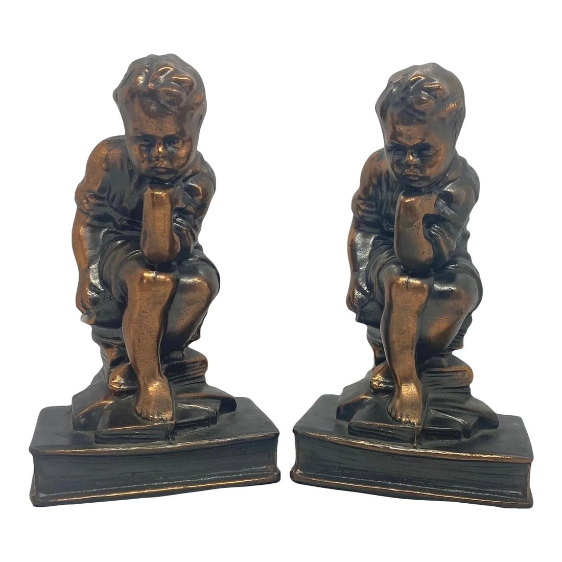 Mid 20th Century Cast Metal With Bronze Tone Bookends With Thinking Boy Sitting on Stack of Books De: Mid 20th Century Cast Metal with Bronze Tone Bookends with Thinking Boy Sitting on Stack of Books Design. This pair of bookends feature a small boy sitting atop a stack of four books, thinking - in Ro
