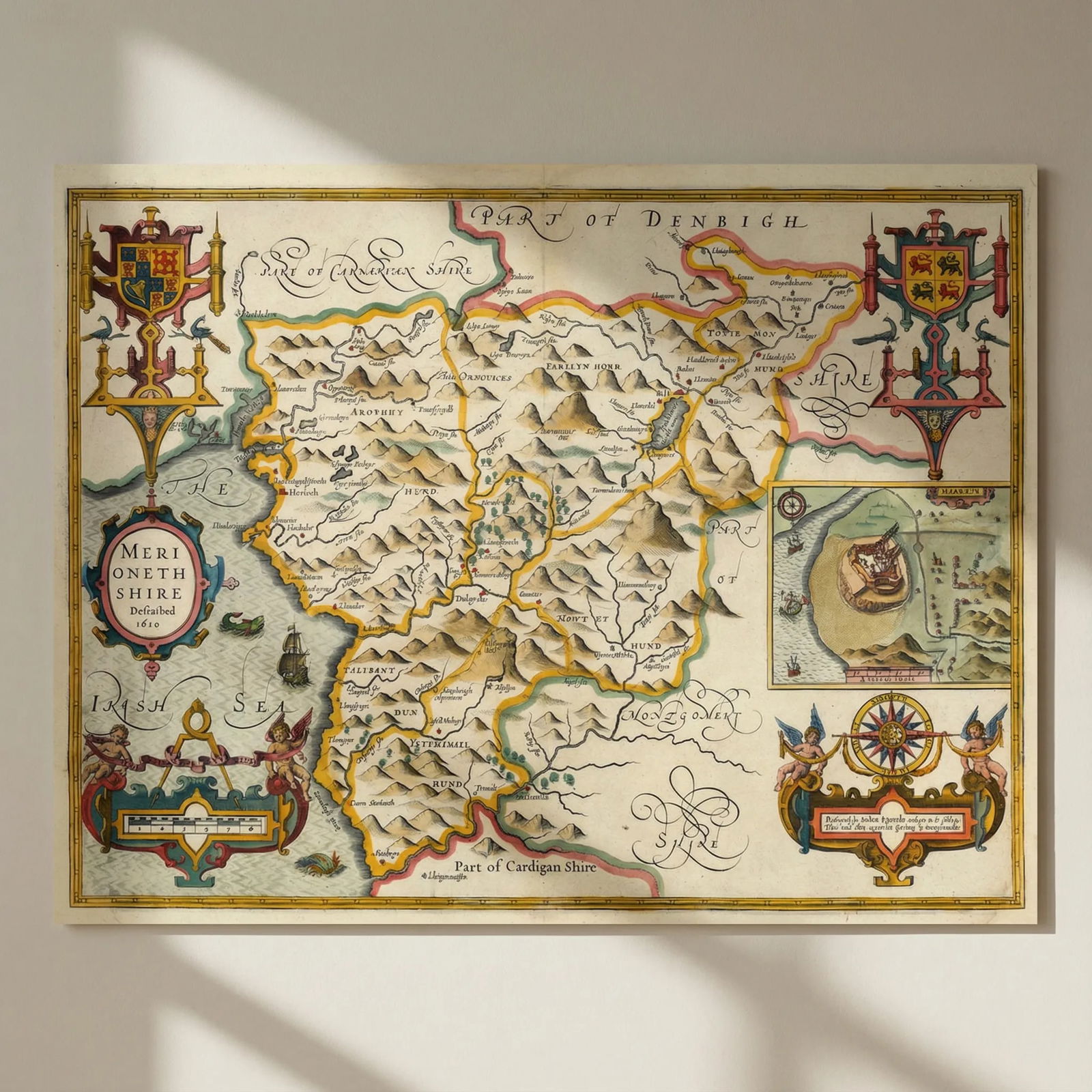Merioneth Shire Described county map by John Speed. George Humble edition 1627: Title: Merioneth Shire Described county map by John Speed. George Humble edition 1627 Description: Merioneth Shire Described 1610'. The map includes an inset town plan of Harlech . Performed by John S