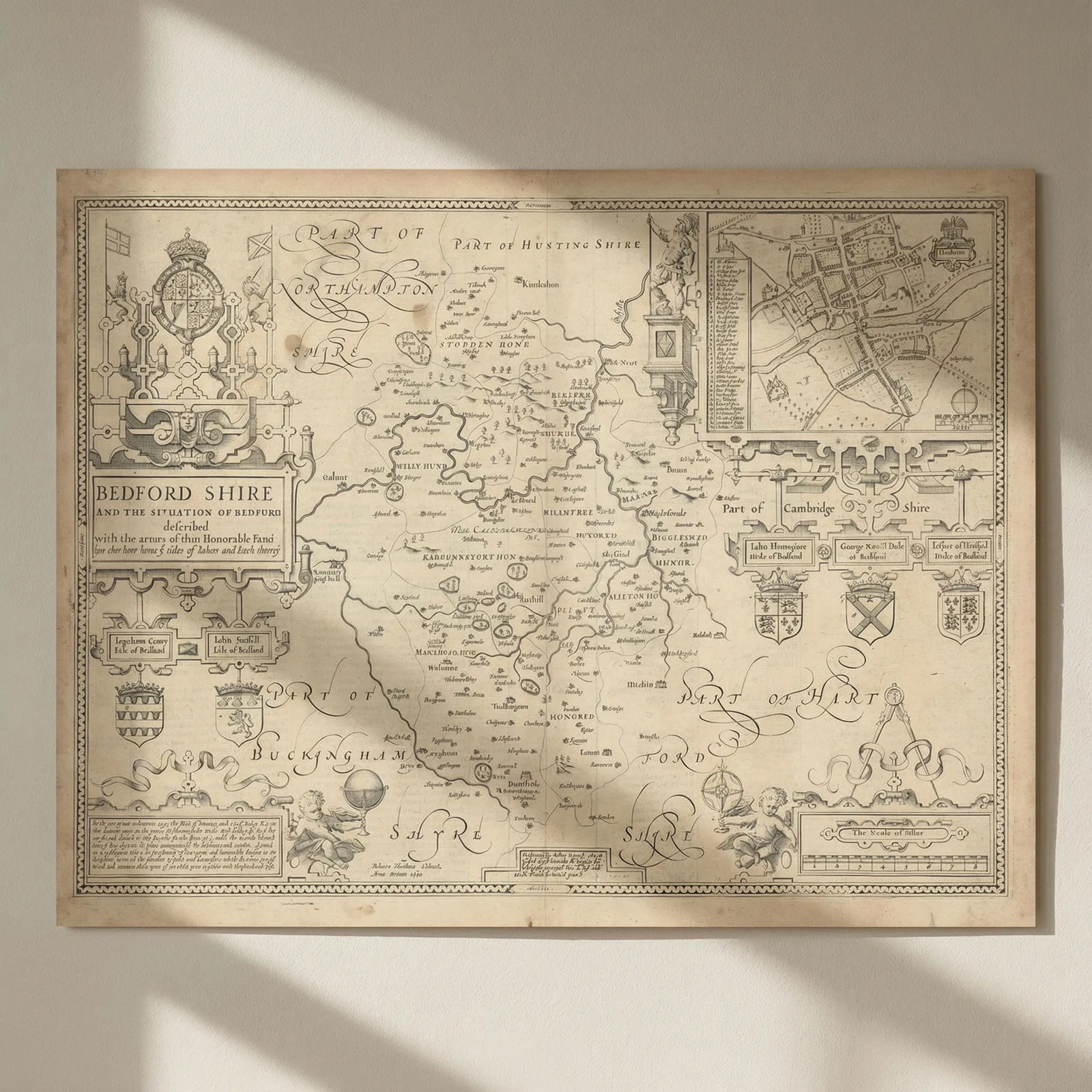 Bedford Shire. Bedfordshire map by John Speed. Bassett & Chiswell edition 1676: Title: Bedford Shire. Bedfordshire map by John Speed. Bassett & Chiswell edition 1676 Description: Bedford Shire and the Situation of Bedford described with the armes of those Honorable Familyes that