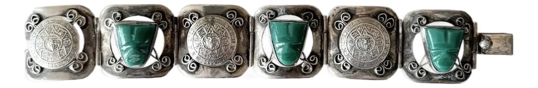 Vintage Aztec Carved Green Onyx and Sterling Silver Wrap Bracelet - Stamped: Wonderful 1940s sterling silver and green onyx Aztec design bracelet. Made in Mexico. Stamped "Sterling." This bracelet depicts faces carved in jade as well as Aztec coins. Condition: Alterations: Ori