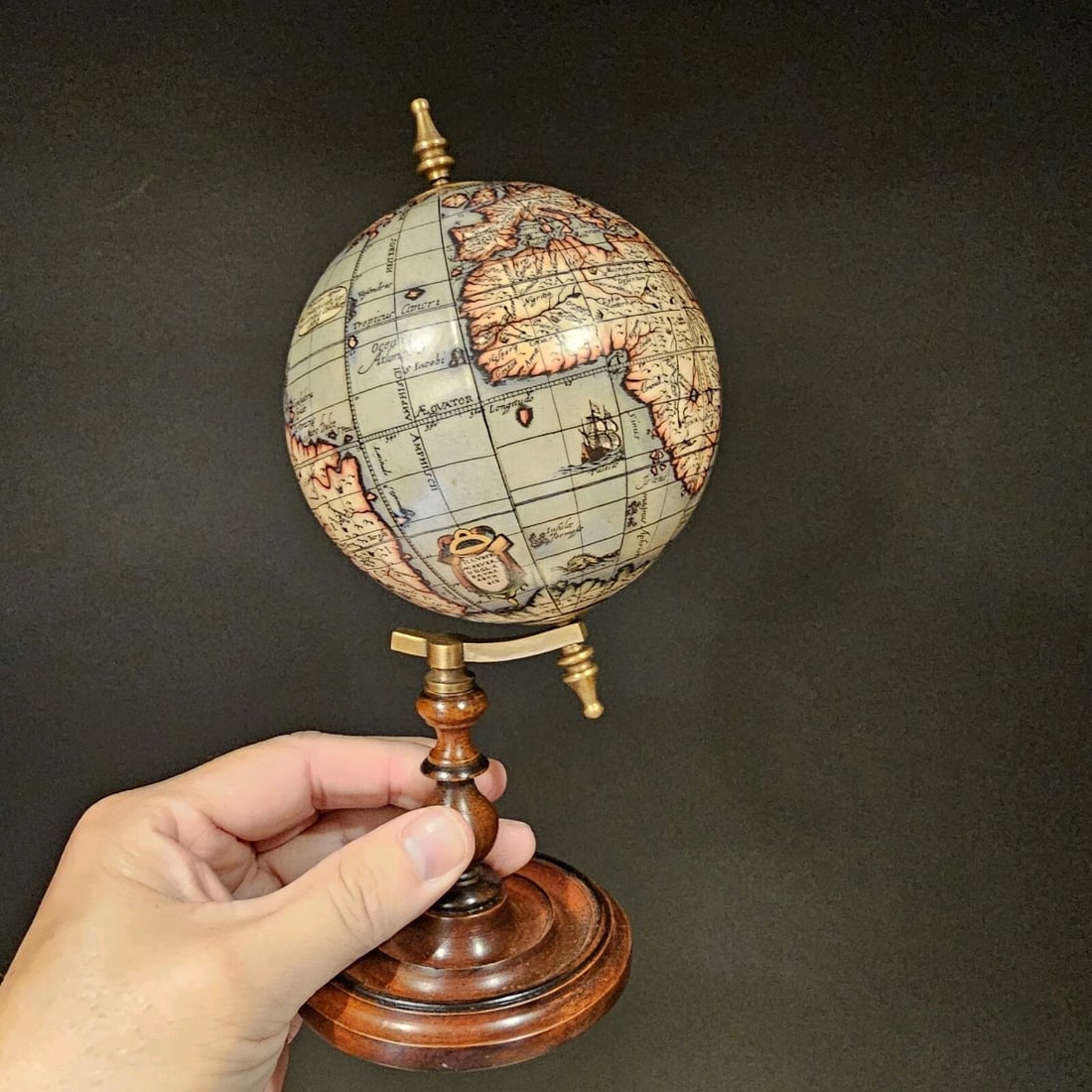 Old World Style 8" Globe w Turned Wood Stand: Title: Old World Style 8" Globe w Turned Wood Stand Description: 8 1/2" Tall 4" Globe Wonderful New reproduction globe. Smaller 8" antique globes like this are seldom seen compared to the larger ones.