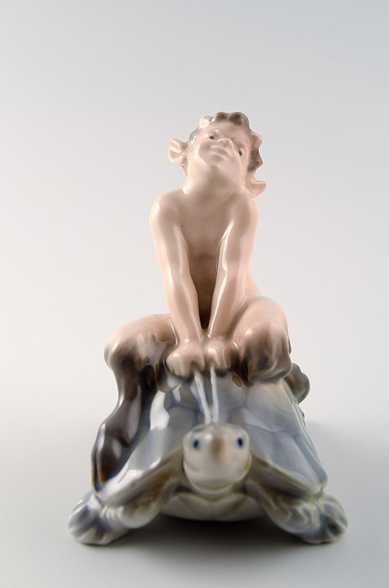 Royal Copenhagen Figurine Faun (Pan) on a turtle. (1 of 5)