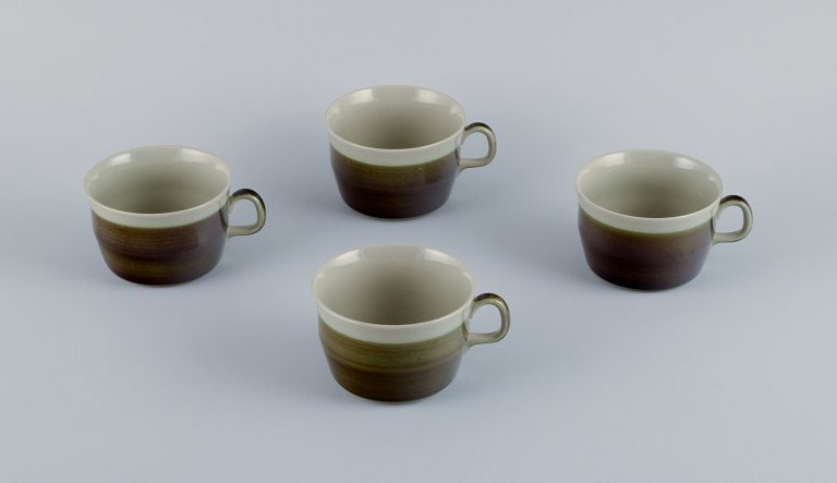Marianne Westman for Rörstrand, "Maya", a set of four coffee cups in stoneware with green-brown: Title: Marianne Westman for Rörstrand, "Maya", a set of four coffee cups in stoneware with green-brown glaze. Description: Marianne Westman for Rörstrand, "Maya", a set of four coffee cups i