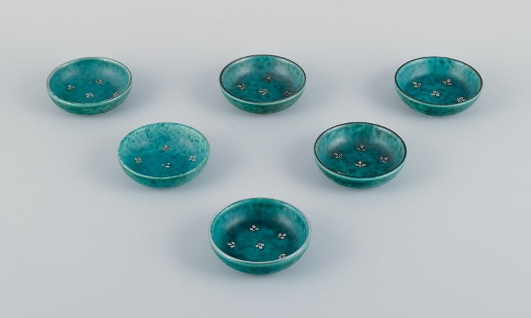 Wilhelm Kåge for Gustavsberg, a set of six "Argenta" ceramic bowls. Glaze in green tones with: Title: Wilhelm Kåge for Gustavsberg, a set of six "Argenta" ceramic bowls. Glaze in green tones with silver inlays in the shape of leaves. Description: Wilhelm Kåge for Gustavsberg, a set of