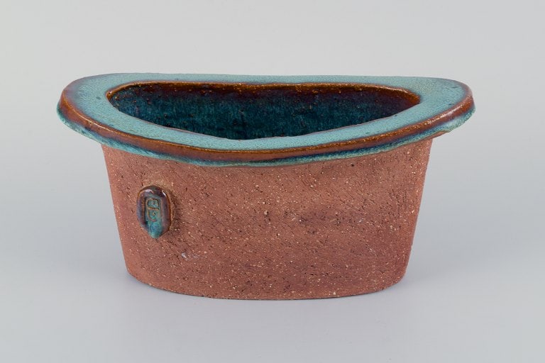 Curt Addin, large bowl in chamotte clay. Interior with turquoise glaze.: Title: Curt Addin, large bowl in chamotte clay. Interior with turquoise glaze. Description: Curt Addin, large bowl in chamotte clay. Interior with turquoise glaze. 1970s. Artist signature. In excellen