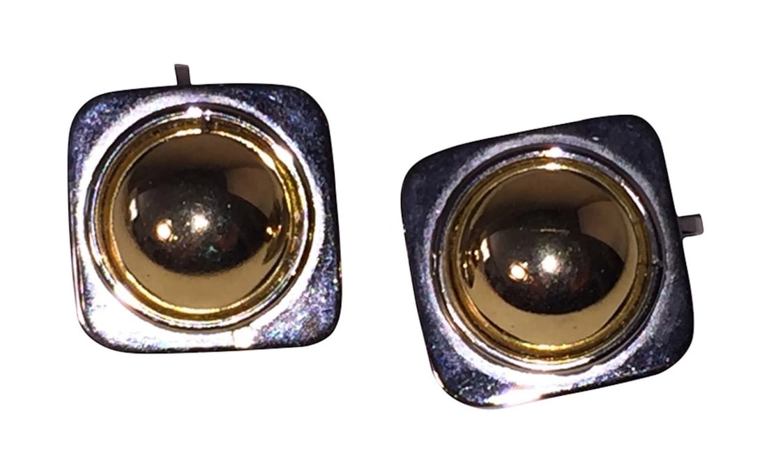 Givenchy Modernist Two Tone Dome Stud Earrings: Title:Givenchy Modernist Two Tone Dome Stud Earrings Description:Stunning early Givenchy two tone chrome and 18 kt gold plated dome earrings. Circa 1950's. Earrings are clip ons and measure 1" long by