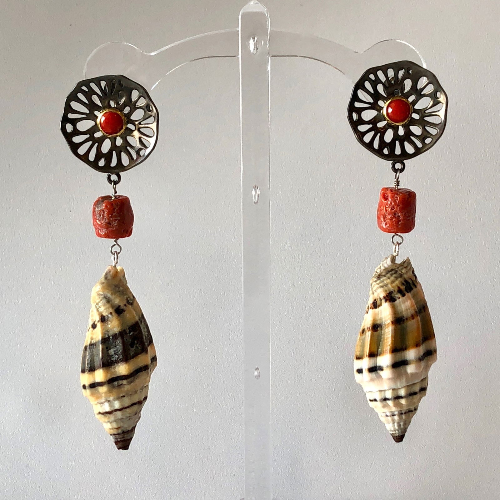 Burnished Sterling and Coral Pierced Earrings: Title:Burnished Sterling and Coral Pierced Earrings Description:Darling and comfortable, these burnished Sterling Silver pierced earrings have a cabochon Coral center, raw Italian bead and lovely Mitr