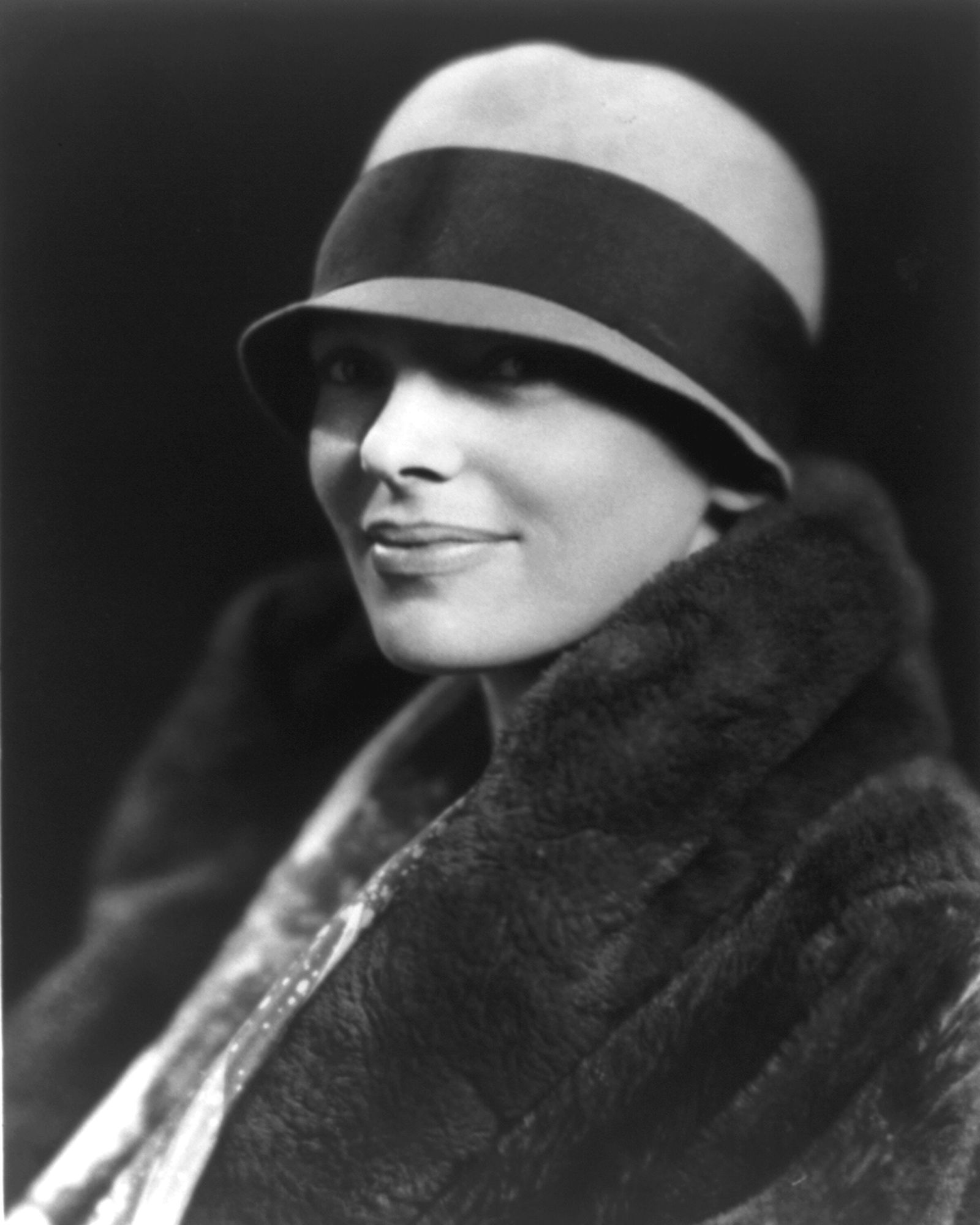 AMELIA EARHART, (1897-1937) IN MENS HAT: Title: AMELIA EARHART, (1897-1937) IN MENS HAT Artist/Source: UNDERWOOD & UNDERWOOD Original Date: UNKNOWN Dimensions: 10X8 Description: || UNITED STATES SHIPPING ONLY! || This lot is a Dye Based Phot
