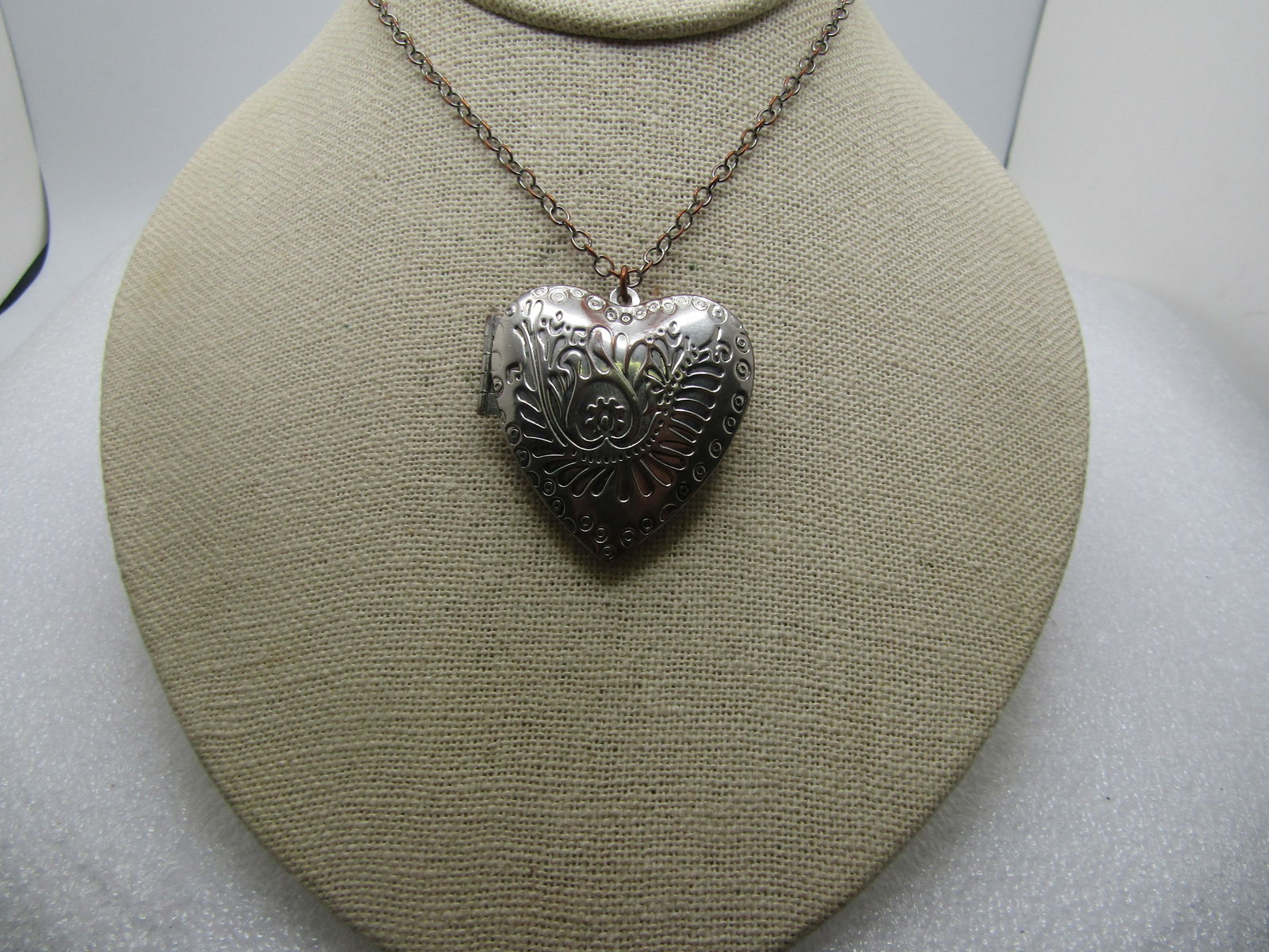 Vintage Heart Locket Necklace, 30", 1980's-1990's: Vintage Heart Locket Necklace, 30", 1980's-1990's. Silver tone hinged heart locket pendant that is appx. 1.75" tall and slightly less wide. it is on a 2.5mm round link chain with lobster clasp and an