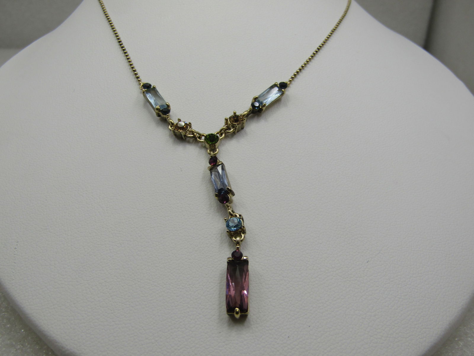 Early 1900's Heart Locket Necklace, 20" 12kt G.F.: Vintage Pastel Rhinestone Lavalier Necklace, 18" with 1.75" drop of baguette and round pastel glass rhinestones. Bail chain that is appx. .09mm with an extender chain that has 3mm wide links at the ba