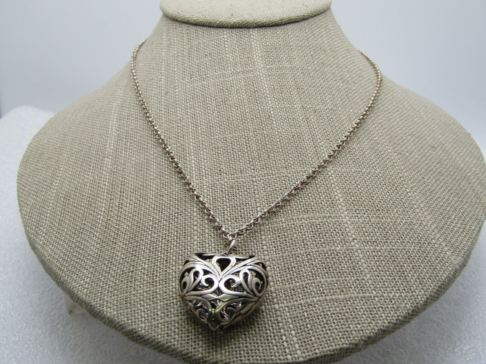 Vintage Stering Scrolled Heart Necklace, 18" , 1980's-1990's: Vintage Stering Scrolled Heart Necklace, 18" , 1980's-1990's, possibly slightly older. The heart is an open scrolled puffy heart that is appx. 1-1/8" tall with bail and 7/8" wide. it is appx. 10mm thi