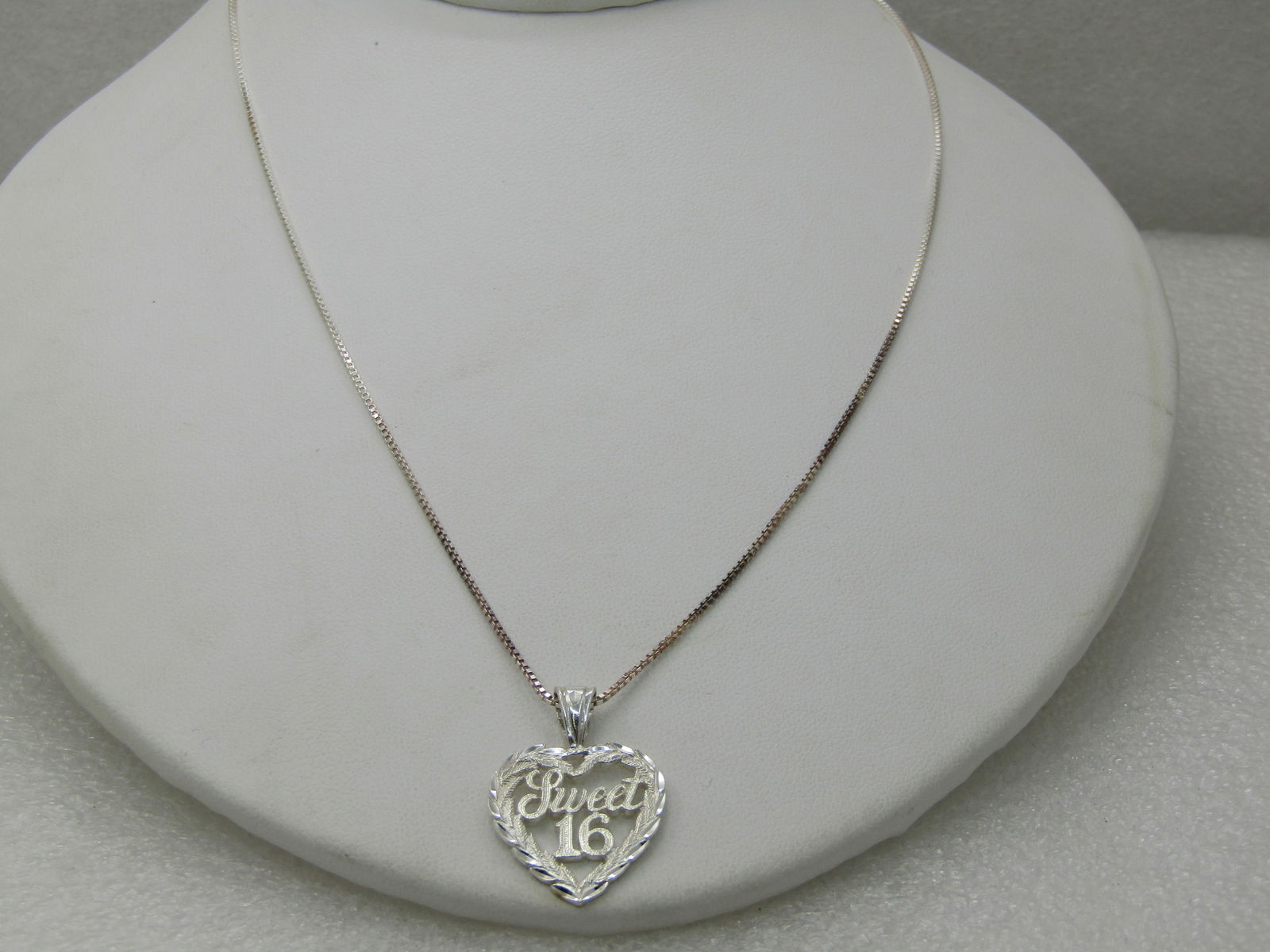 Vintage Sterling Sweet 16 Heart Necklace, 18" Box Chain, Signed: Vintage Sterling Sweet 16 Heart Necklace, 18" Box Chain, Signed GSJ, weight is appx. 4.50 gr. Box chain is appx. 1mm wide. Marked .925 and tested. (INV. WCOV.11 SS2401 LET LD 10/17/20) Reserve: $30.00
