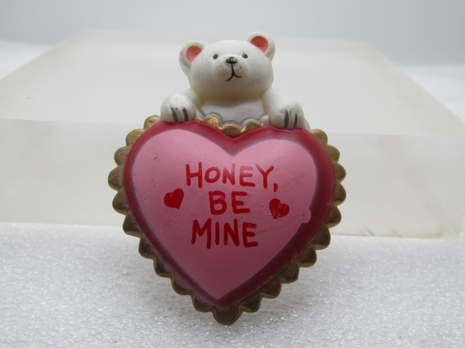 Vintage Honey Be Mine Bear/Heart Brooch, 1980's, Valentine Brooch: Vintage Honey Be Mine Bear/Heart Brooch, 1980's. Valentine Brooch. Plastic puffy heart with red and pink and gold scalloped frame and a white bear on top. It is appx. 2.25" tall and 1.75" wide. Signed