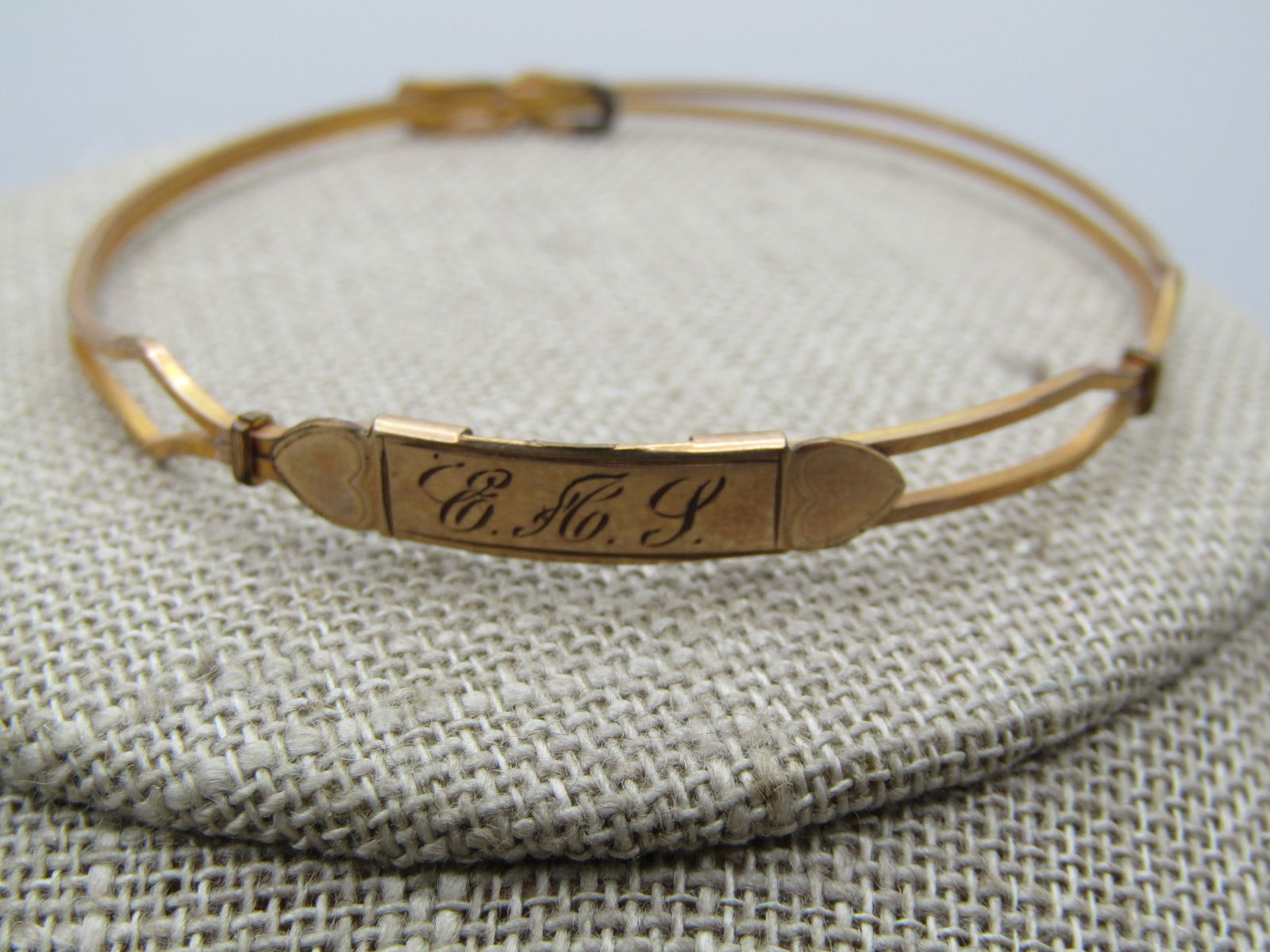 Antique 10kt G.F. Engraved E A L Bangle Bracelet, 6", With Hearts, Early 1900's: Antique 10kt G.F. Engraved E A L Bangle Bracelet, 6", With Hearts, Early 1900's. Believe a youth expanding bracelet. This is made of a double wrap of 10kt g.f. square heavy wire that creates a sliide
