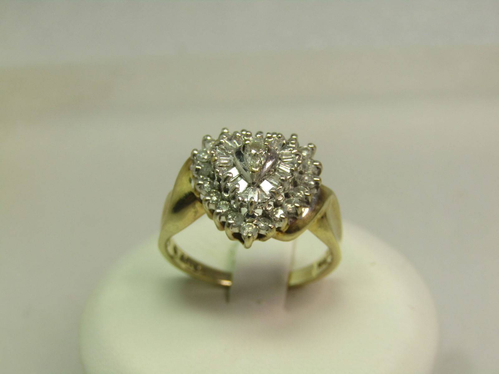 Vintage 10kt Diamond Tiered Heart Ring, Promised Ring, Sz. 7.5, 1980's, Signed: Vintage 10kt Diamond Tiered Heart Ring, Sz. 7.5, 1980's, Signed with a maker's mark that looks like an arrow with A170. Marked 10kt and tests as 10kt (yellow and white gold) with an appx. weight of 4.