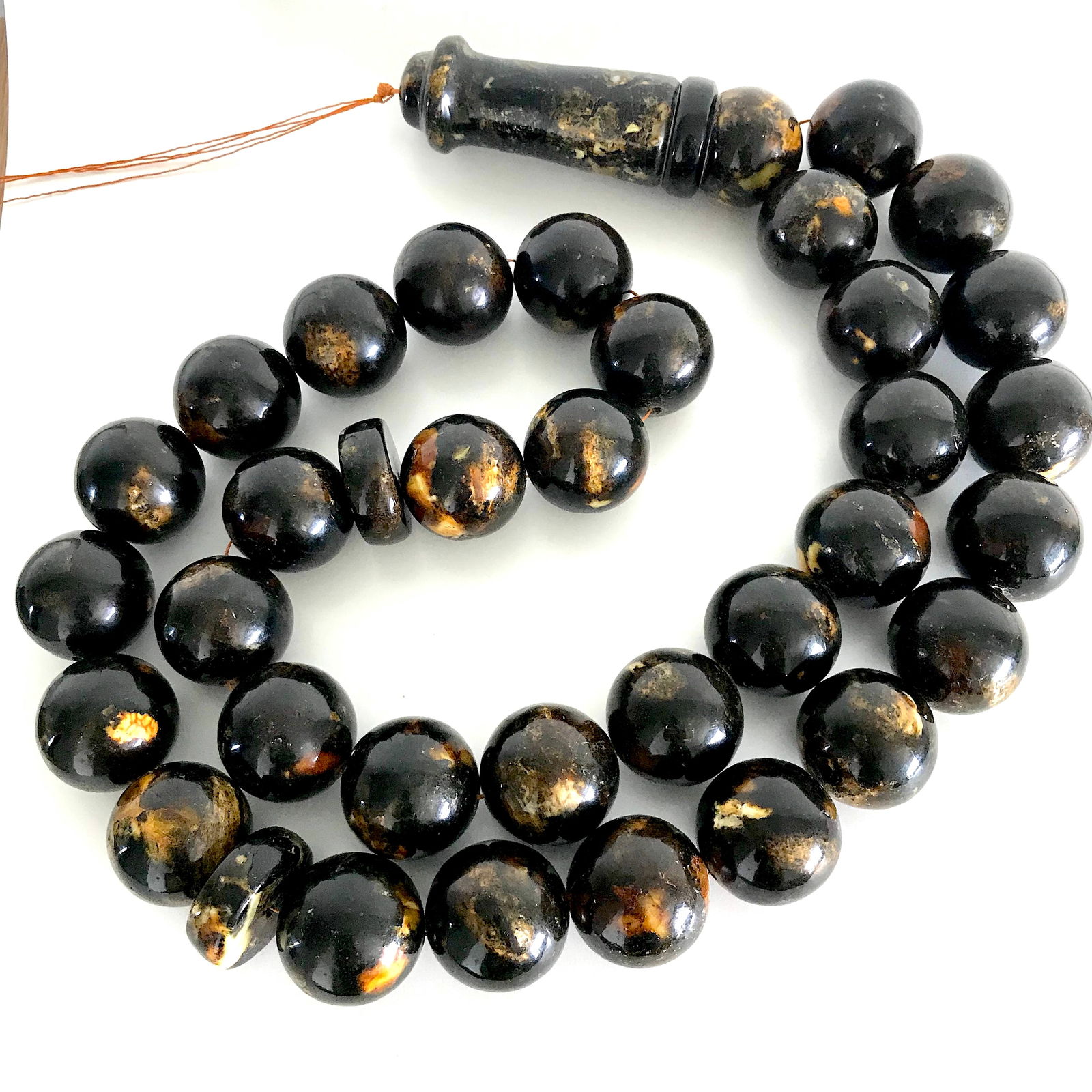 Unique and Stunning Amber Tesbih made from Round Amber beads: Title:Unique and Stunning Amber Tesbih made from Round Amber beads Metal:None Gemstone:Amber Weight:1975.0 g Size:Bead size: 45.0 x 0 mm Bead size: 1.772 x 0.0 inches Made of:(Reconstituted Amber or W