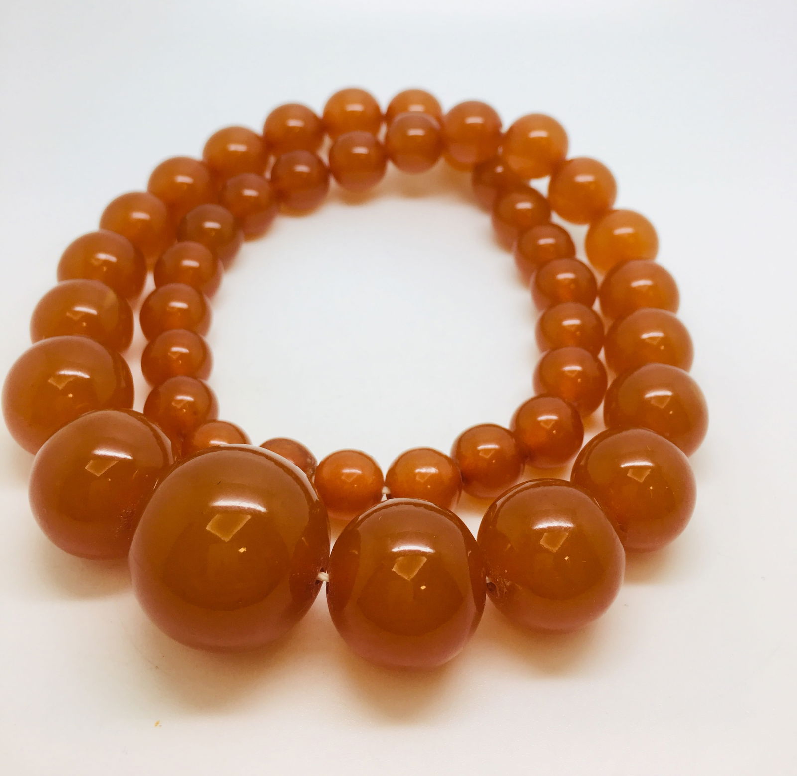 Staggering Unique Vintage Amber Necklace made from Round Amber beads: Title:Staggering Unique Vintage Amber Necklace made from Round Amber beads Metal:None Gemstone:Amber Weight:63.4 g Size:Bead size: 23.4 to 10.4 mm Bead size: 0.921 to 0.409 inches Made of:(Reconstitut