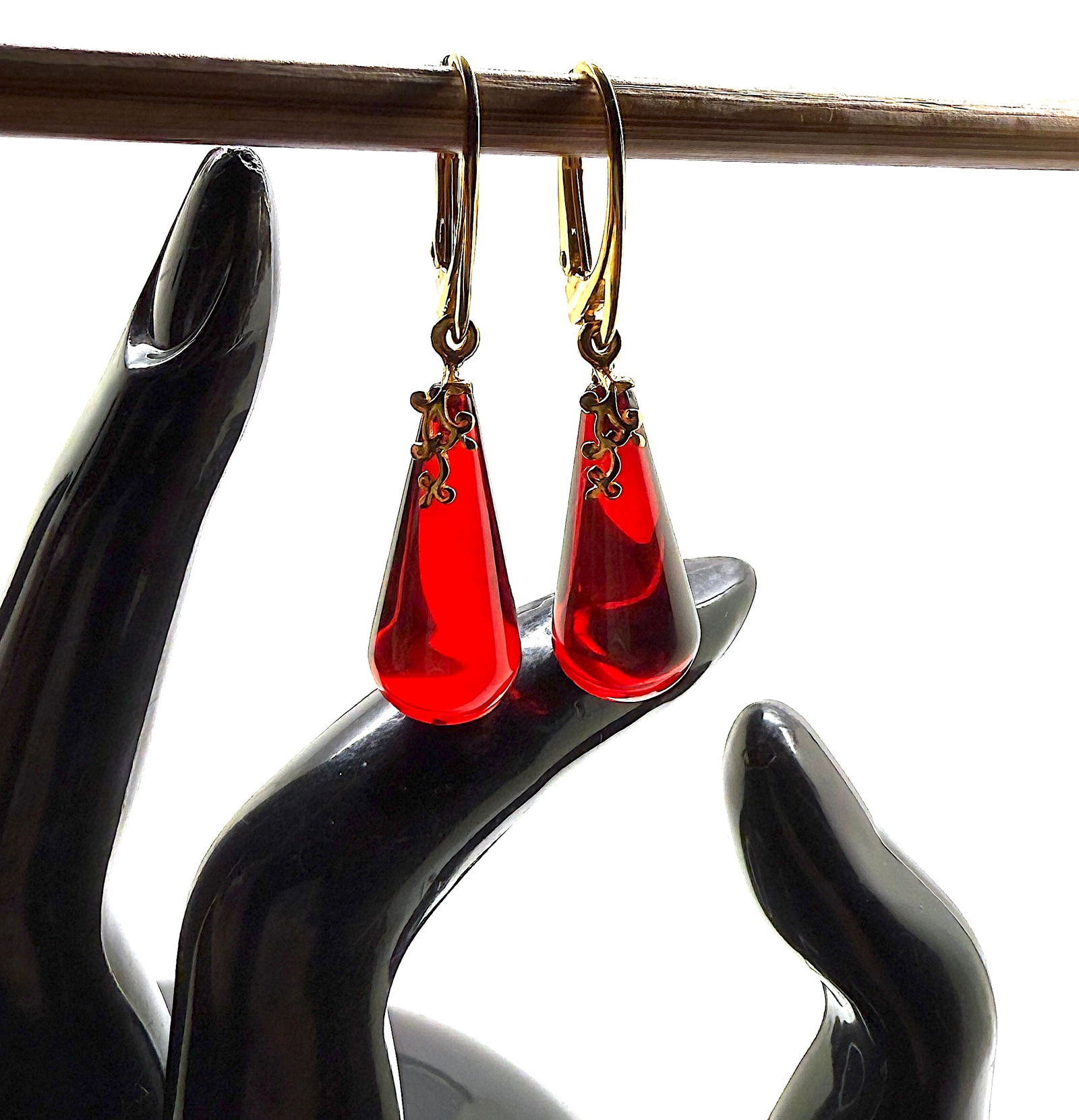 Remarkable Amber Earrings: Title:Remarkable Amber Earrings Metal:925 Silver-Gold Plated Gemstone:Amber Weight:4.7 g Size:Size: 43.0 x 10.0 x 10.0 mm Size: 1.693 x 0.394 x 0.394 inches Made of:(Reconstituted Amber or Whole Stone