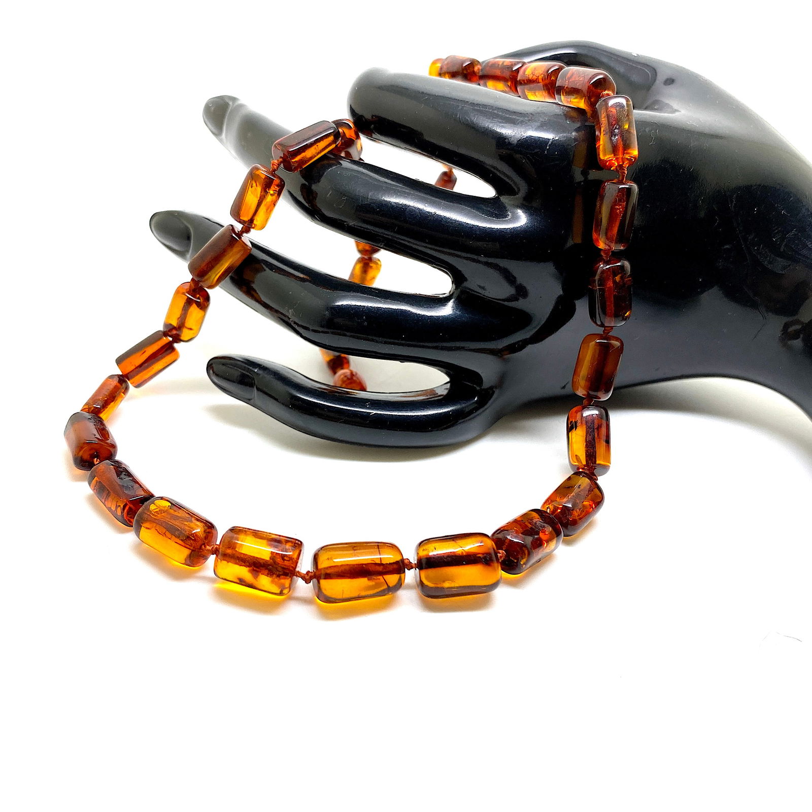 Unique and Marvellous Amber Necklace made from Barrel shaped Amber beads: Title:Unique and Marvellous Amber Necklace made from Barrel shaped Amber beads Metal:Gold Plated Gemstone:Amber Weight:14.6 g Size:Bead size: 6.5 x 10.5 mm Bead size: 0.256 x 0.413 inches Made of:(Rec