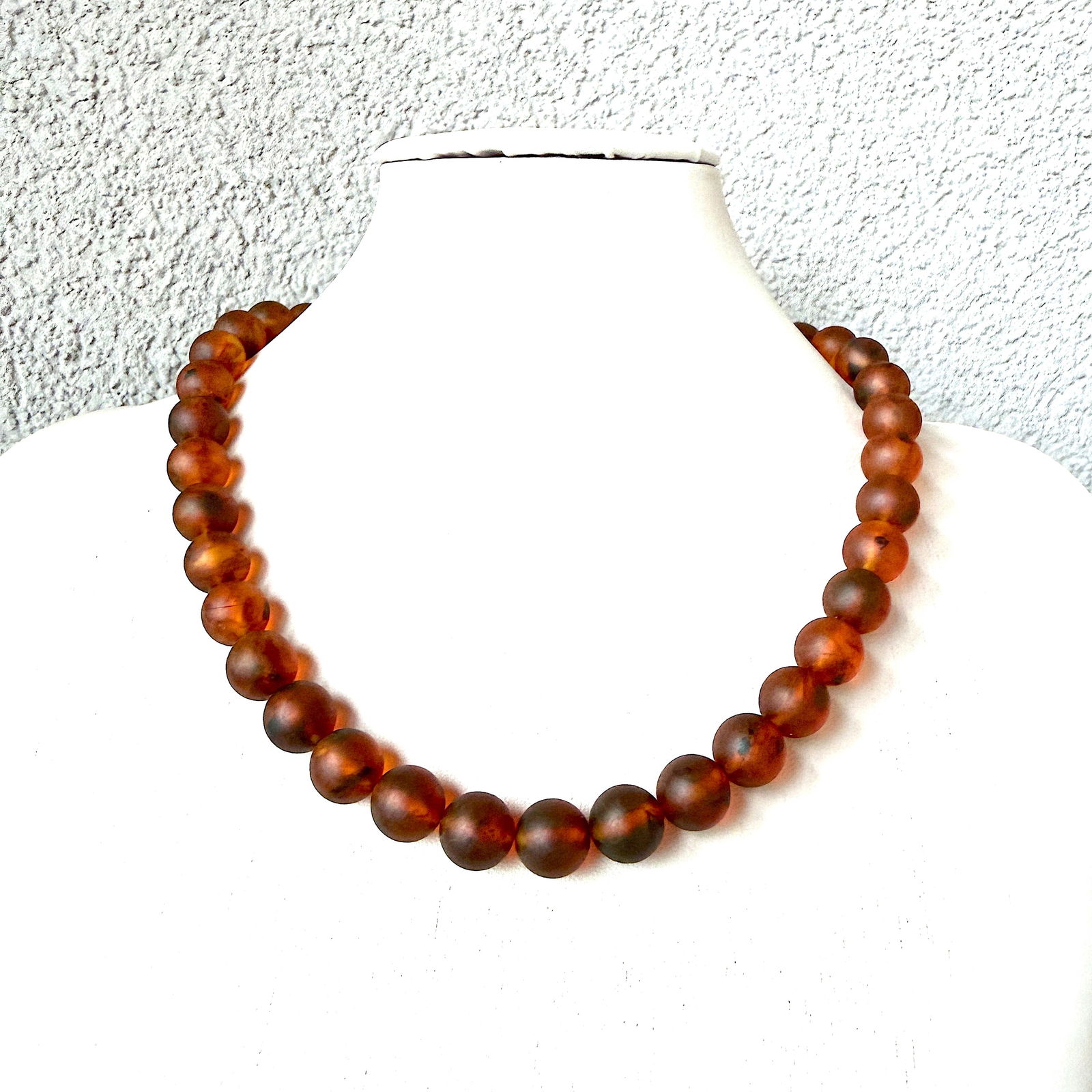 Grand Amber Necklace made from Round Amber beads: Title:Grand Amber Necklace made from Round Amber beads Metal:None Gemstone:Amber Weight:38.0 g Size:Size: 12.0 x 12.0 x 48.0 mm Size: 0.472 x 0.472 x 1.89 inches Bead size: 12.0 mm Bead size: 0.472 in