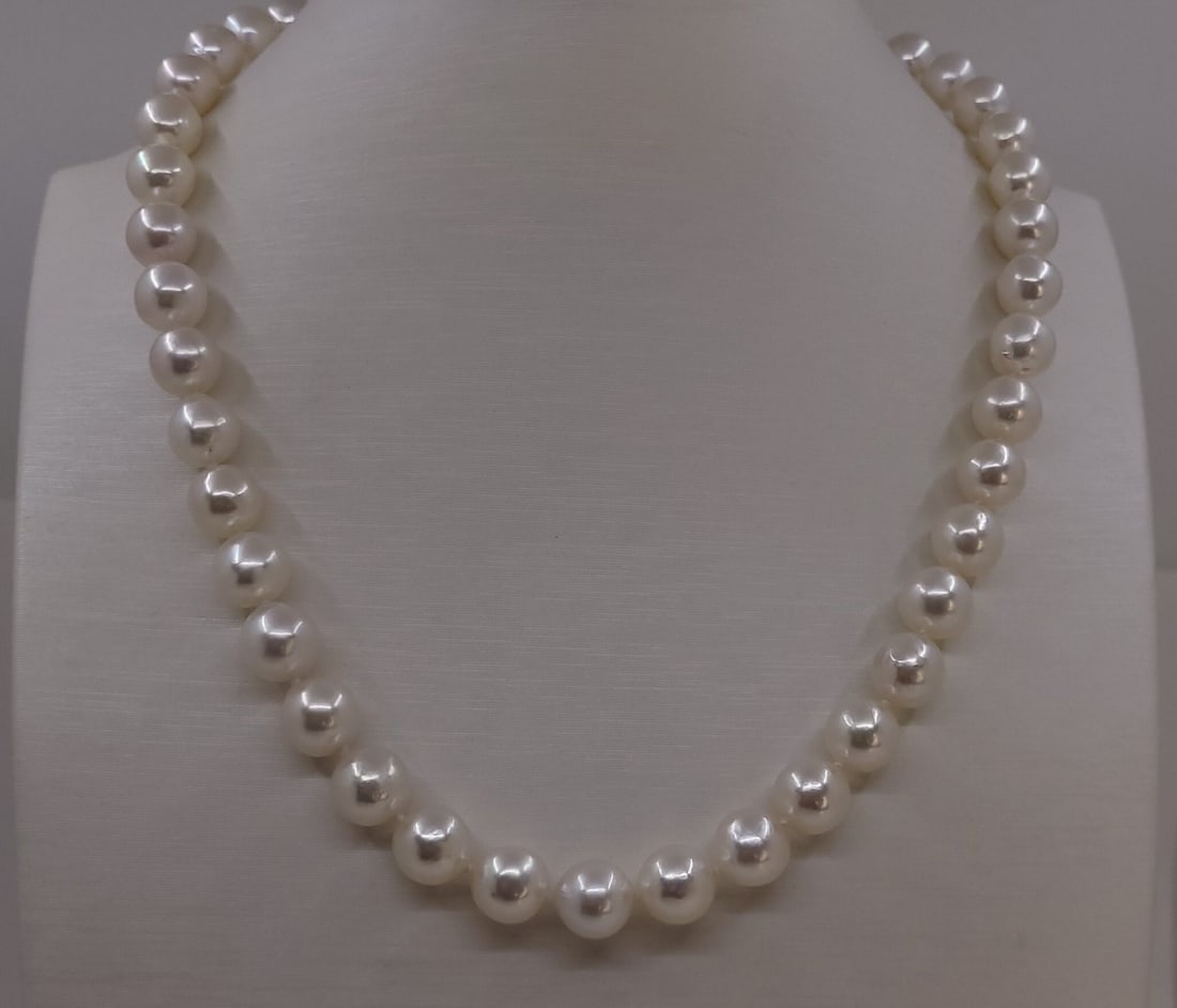 Necklace 9x9.5mm Akoya Pearls: Title: Necklace 9x9.5mm Akoya Pearls Description: A beautiful pearl necklace of white saltwater AA Akoya pearls with exceptional lustre, finished with a solid silver clasp. The classic Akoya pearl is