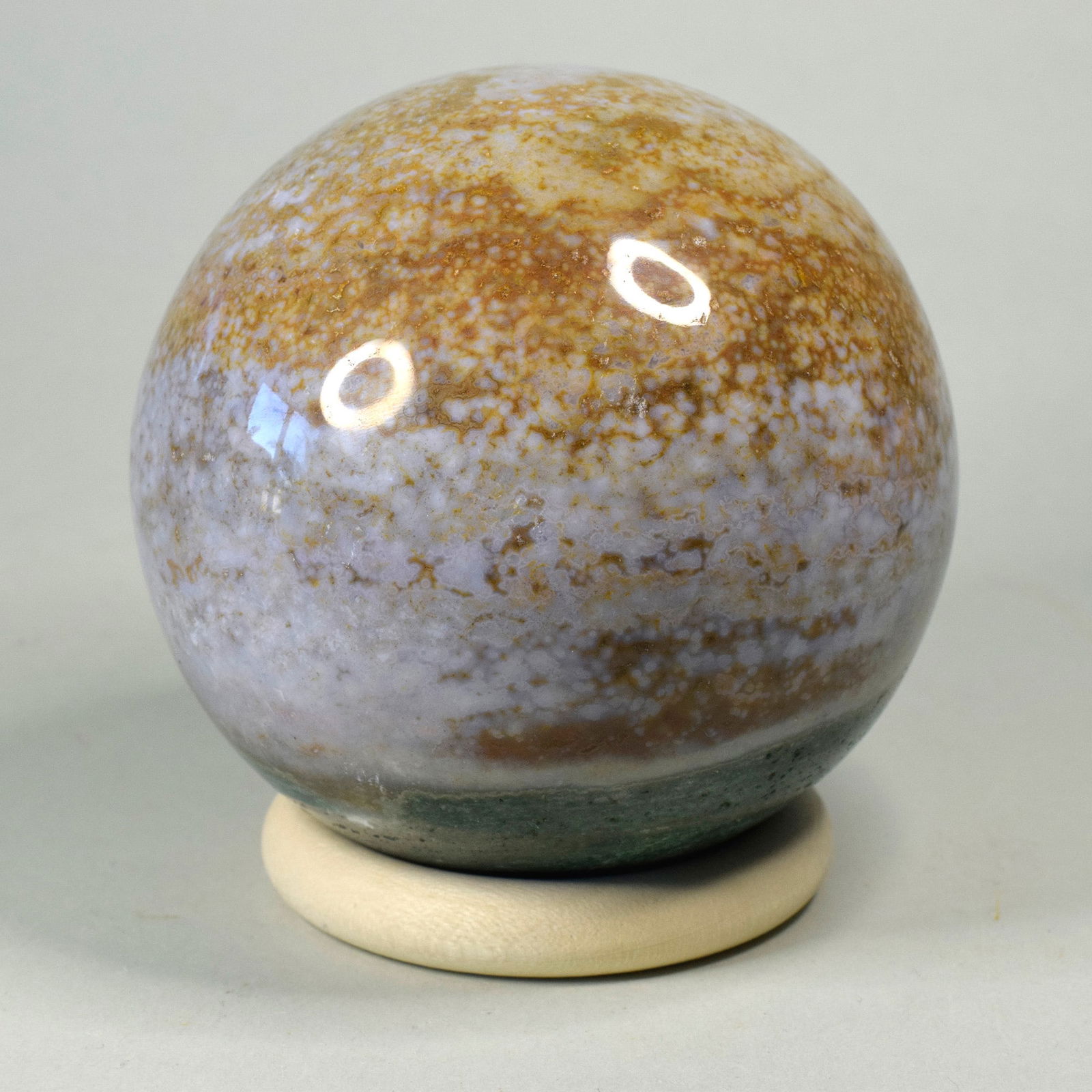 7.8 cm Polished Ocean Jasper sphere: Title: 7.8 cm Polished Ocean Jasper sphere Origin: Madagascar Size: 7.8 cm diameter Description: Species: Jasper (Ocean Jasper) Locality: Madagascar Diameter: 7.8 cm Weight: 0.65 kg Fine polished ocea