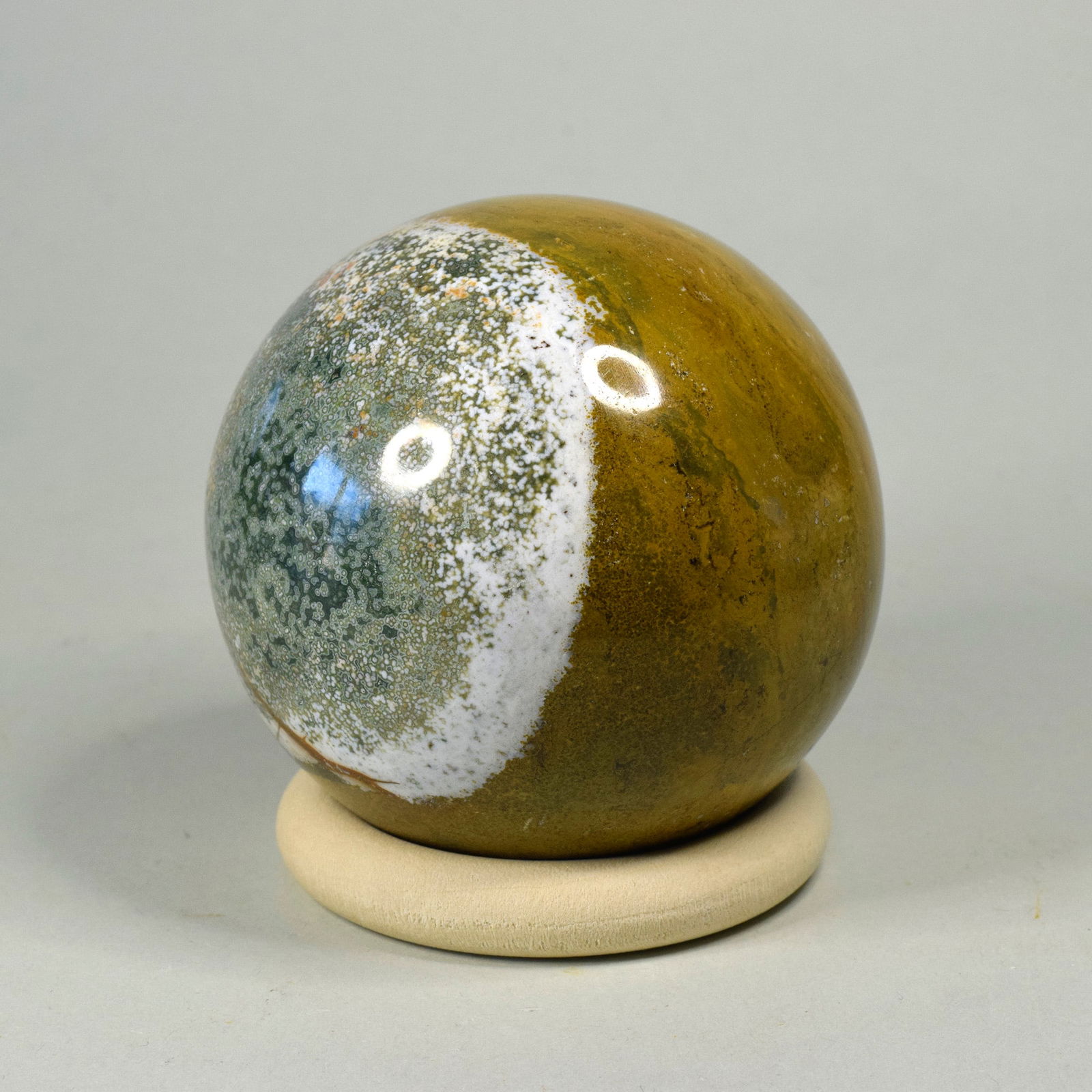 6.7 cm Polished Ocean Jasper sphere: Title: 6.7 cm Polished Ocean Jasper sphere Origin: Madagascar Size: 6.7 cm diameter Description: Species: Jasper (Ocean Jasper) Locality: Madagascar Diameter: 6.7 cm Weight: 0.39 kg Fine polished ocea