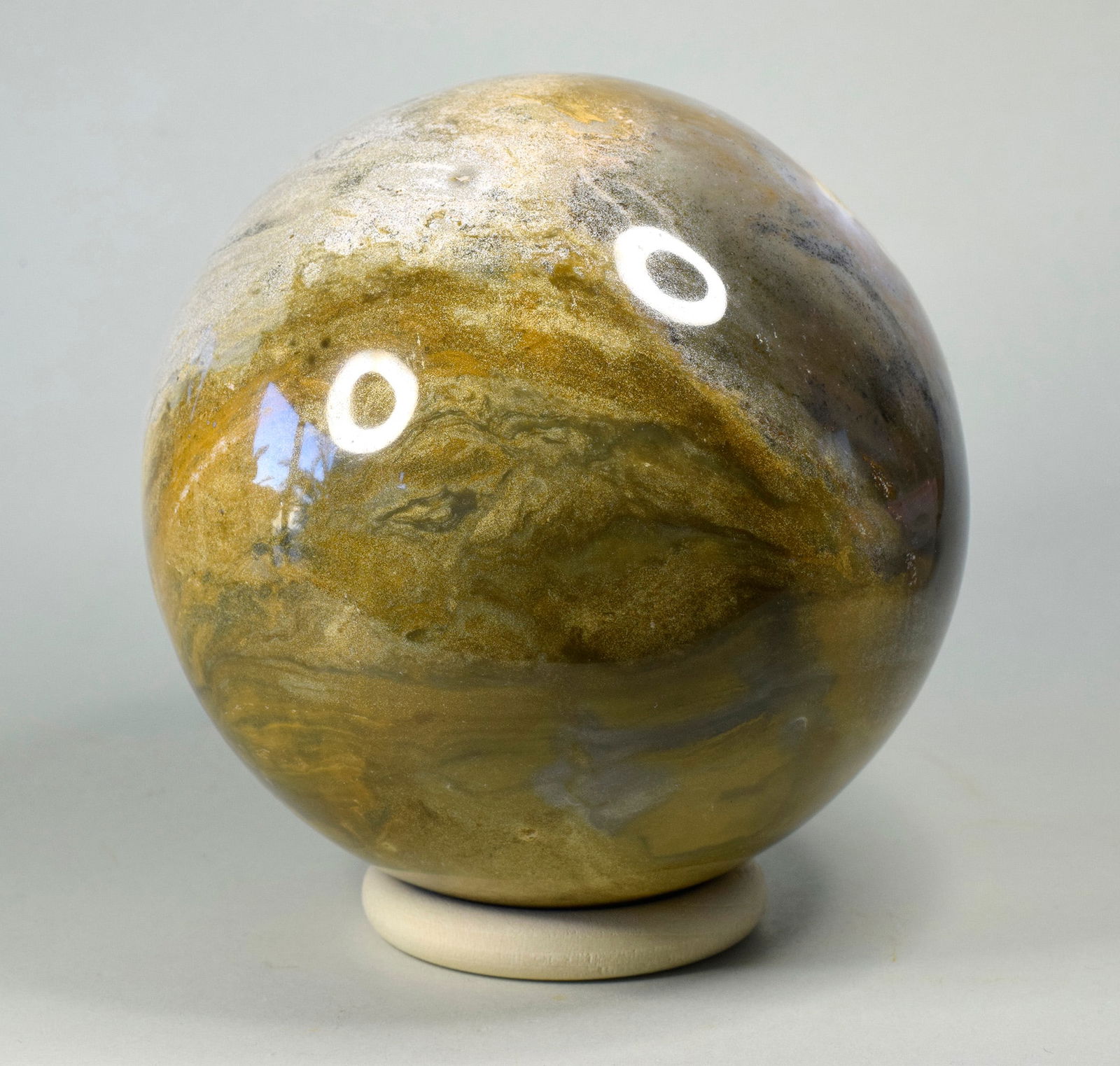 11 cm Polished Ocean Jasper sphere: Title: 11 cm Polished Ocean Jasper sphere Origin: Madagascar Size: 11 cm diameter Description: Species: Jasper (Ocean Jasper) Locality: Madagascar Diameter: 11 cm Weight: 1.82 kg Fine polished ocean j