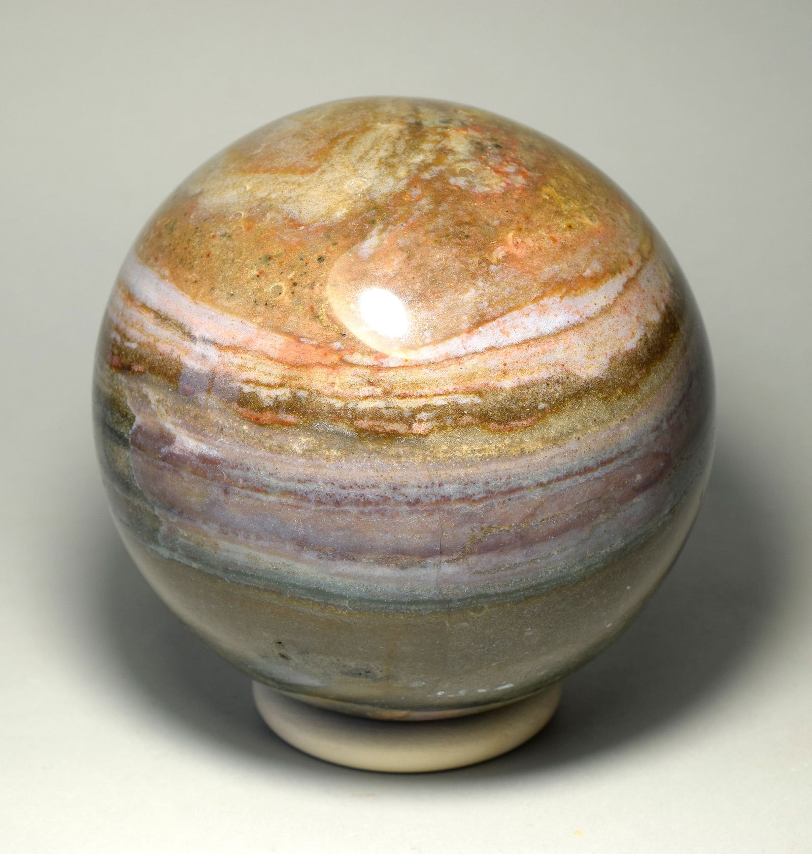 10.7 cm Polished Ocean Jasper sphere: Title: 10.7 cm Polished Ocean Jasper sphere Origin: Madagascar Size: 10.7 cm diameter Description: Species: Jasper (Ocean Jasper) Locality: Madagascar Diameter: 10.7 cm Weight: 1.69 kg Fine polished o