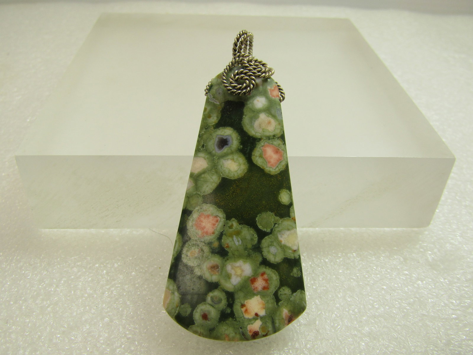 Vintage Sterling Coil Wrapped Ocean Agate Pendant, 1980's-1990's: Vintage Sterling Coil Wrapped Ocean Agate Pendant, 1980's-1990's . The pendant is a tapered elongated stone that is believed to be natural ocean jasper. It is appx. 2-7/8" long with bail and appx. 1-1