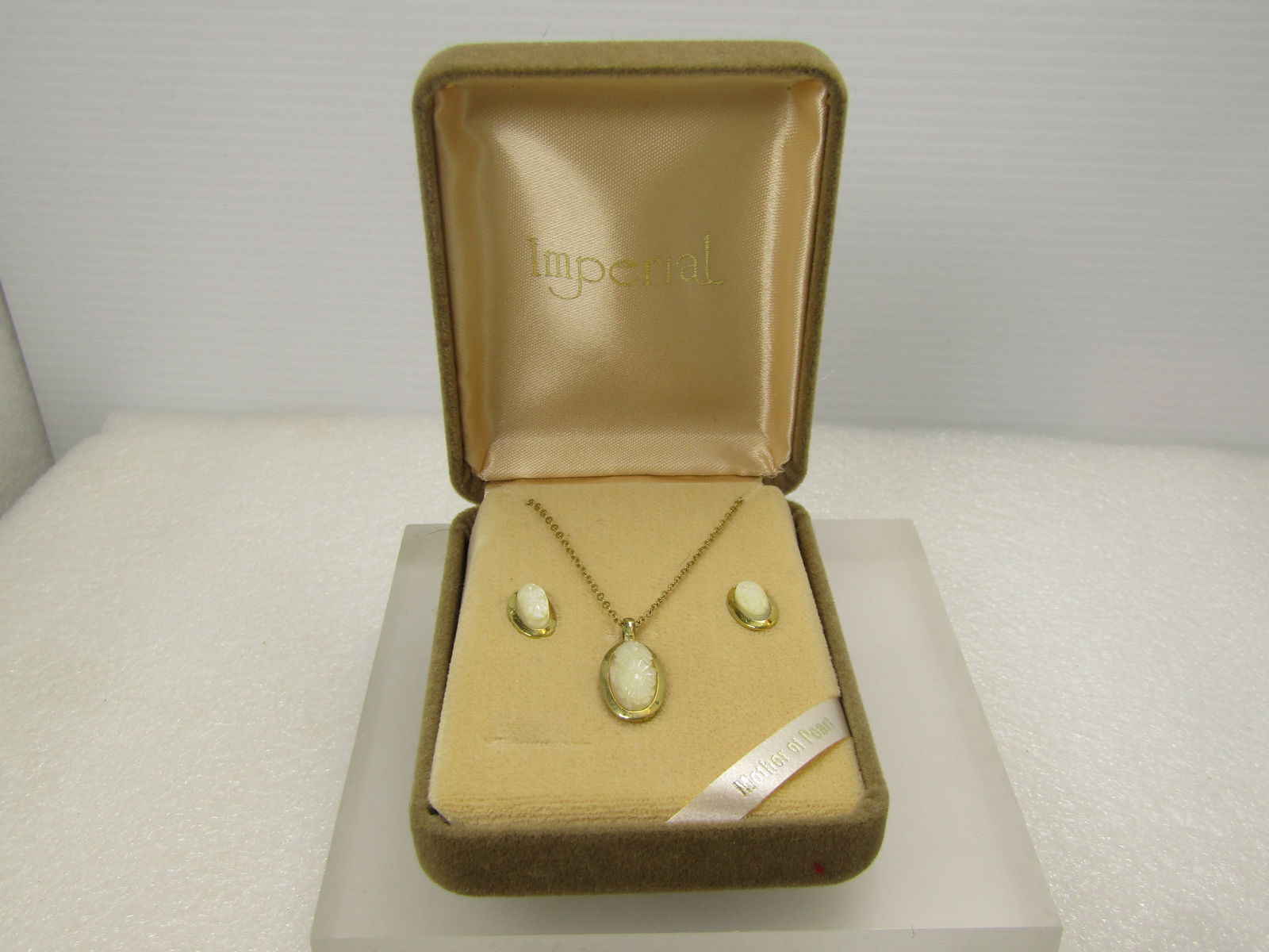 Vintage Carved Floral Cameo Necklace & Earrings, Imperial, 4kt GF Original Box, 1960's: Carved Floral Cameo Necklace & Earrings, 14kt GF and Sterling Plated, Original Box, 1960's. The pendant and earrings are sterling silver and gold plated with the chain being 1/20 14kt Gold Filled. It