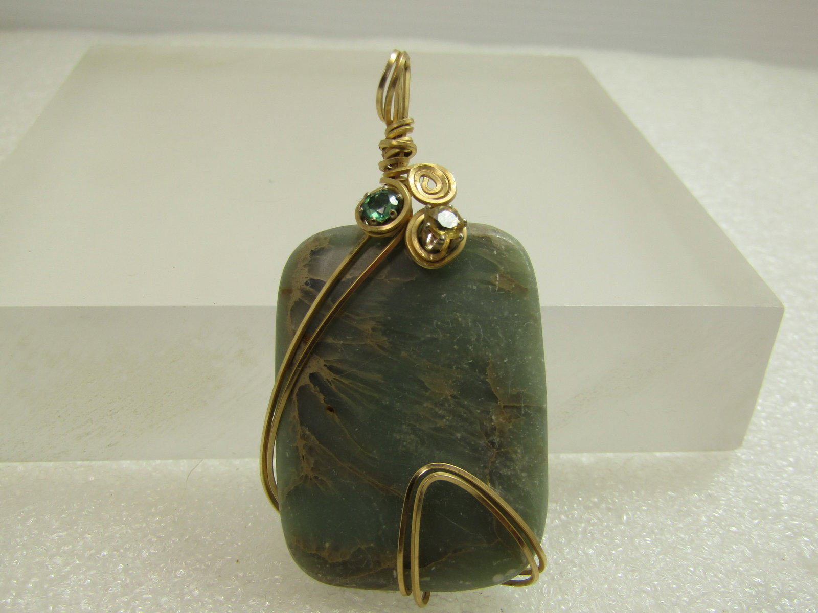 Vintage Green Quartz/Agate/Spinel Wrapped Stone Pendant, 10kt G.F.: Vintage Green Quartz/Agate/Spinel Wrapped Stone Pendant, 10kt G.F. The wrp around the 1.5" tall and 1-1/3" wide green agate/quartz rectangular stone with a minty green color and brown veining is doubl