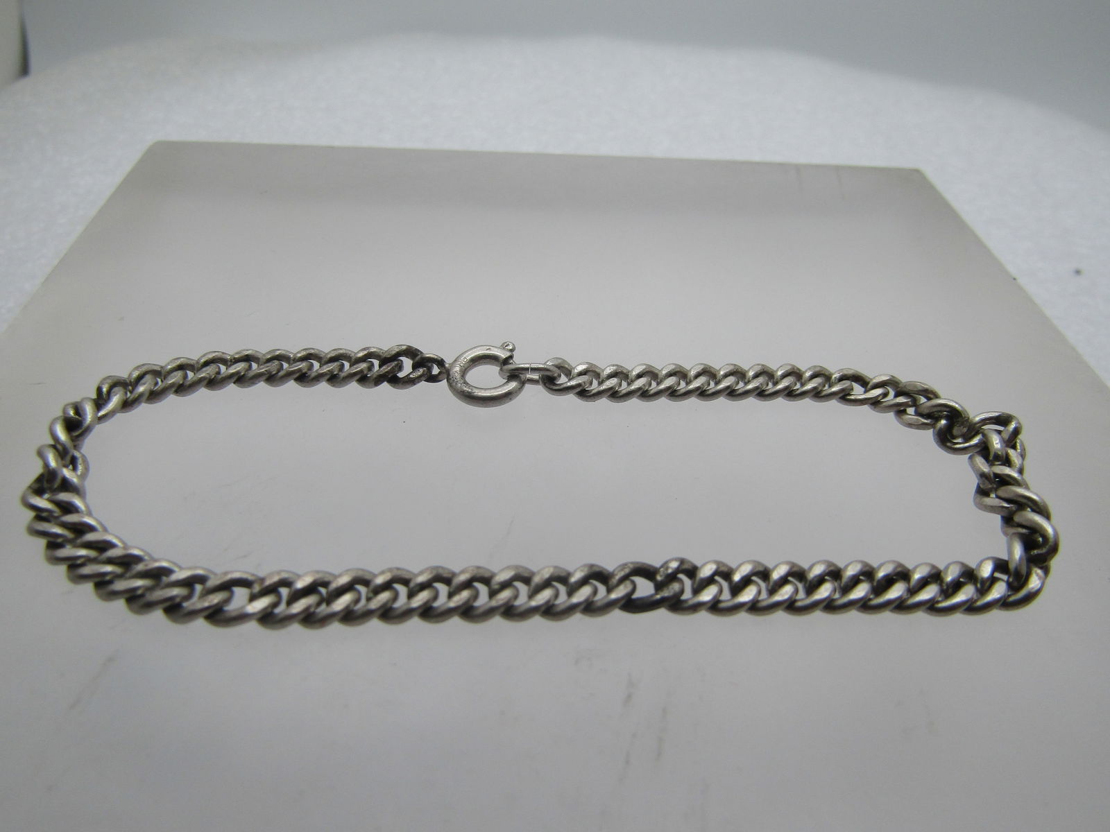 Vintage Sterling Curb Link Bracelet, 7.25", 4mm, Unisex, 1960's-1970's: Vintage Sterling Curb Link Bracelet, 7.25", 4mm, Unisex, 1960's-1970's. It has a spring clasp and is marked sterling and tests as sterling with a weight of appx. 7.92 gr. It is not signed by the maker