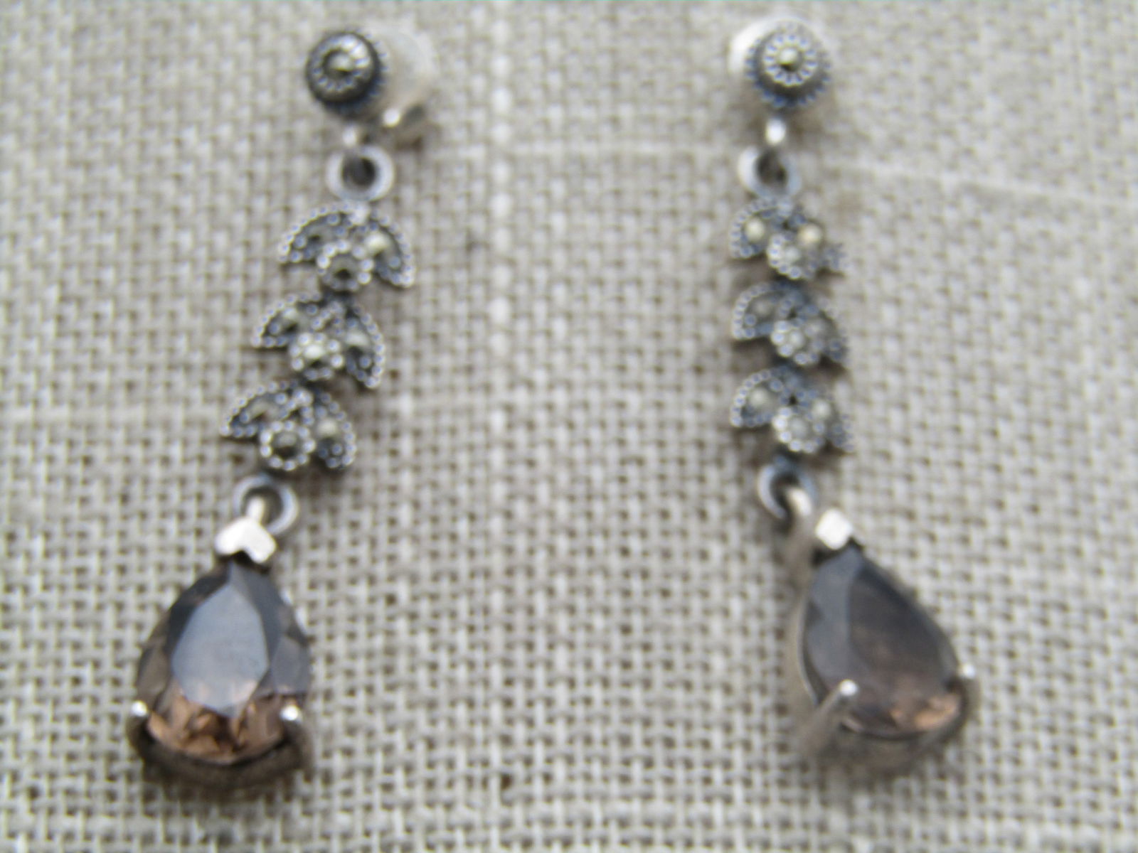 Vintage Sterling Marcasite Smoky Topaz Earrings, Pierced, Signed R.J. , 1980's-1990': Vintage Sterling Marcasite Smoky Topaz Earrings, Pierced, Signed R.J. , 1980's-1990's. Stud and drop pierced earings. They are marked .925 and test as sterling with a weight of papx. 3.61 gr. They hav