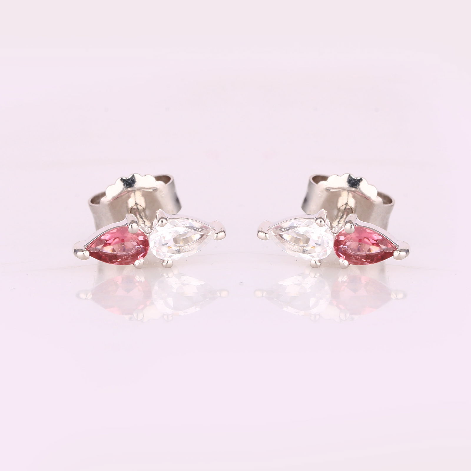 Ring: Pink Tourmaline Pears 5x3mm: No Reserve! Title: Ring: Pink Tourmaline Pears 5x3mm Description: Pink Tourmaline Pears 5x3mm - 1Pc + White Topaz Pears 5x3mm - 1Pc Date/Period: After 2000 Materials: 925 Silver W/Rhodium Gross Weight