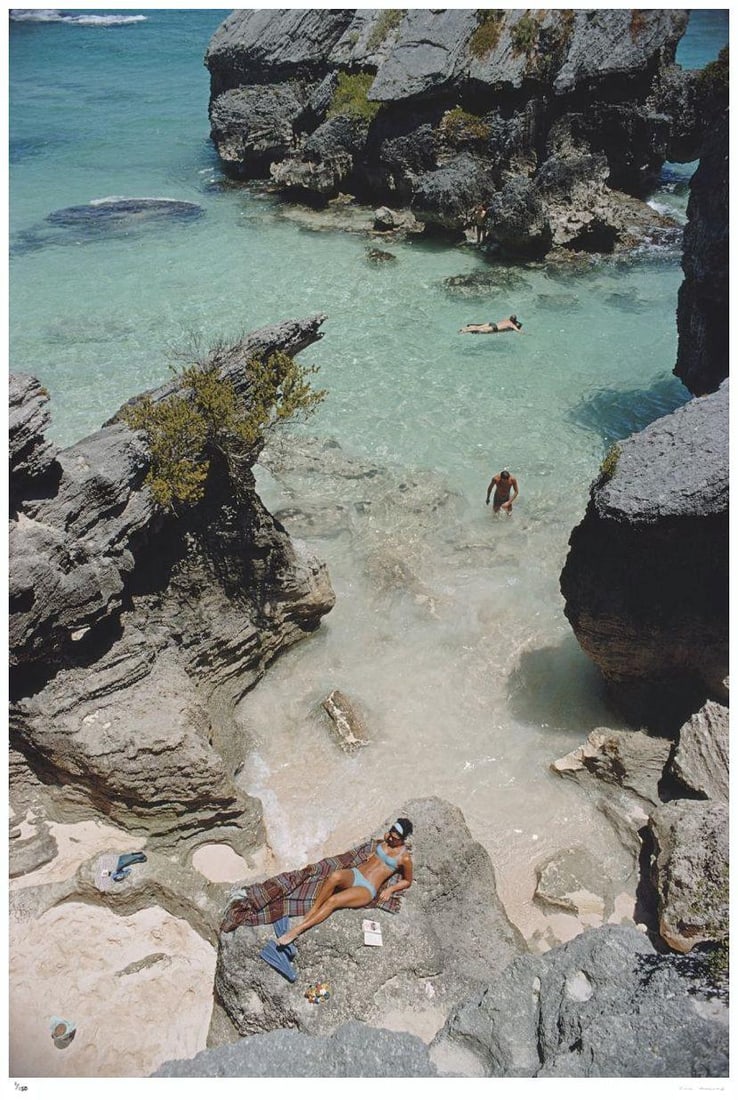 On The Beach In Bermuda 1967 - Slim Aarons Estate Stamped: 1967 (printed later): Title: On The Beach In Bermuda 1967 - Slim Aarons Estate Stamped: 1967 (printed later) Description: On The Beach In Bermuda 1967 - Slim Aarons Estate Stamped Sunbathing and swimming at a beach in Berm